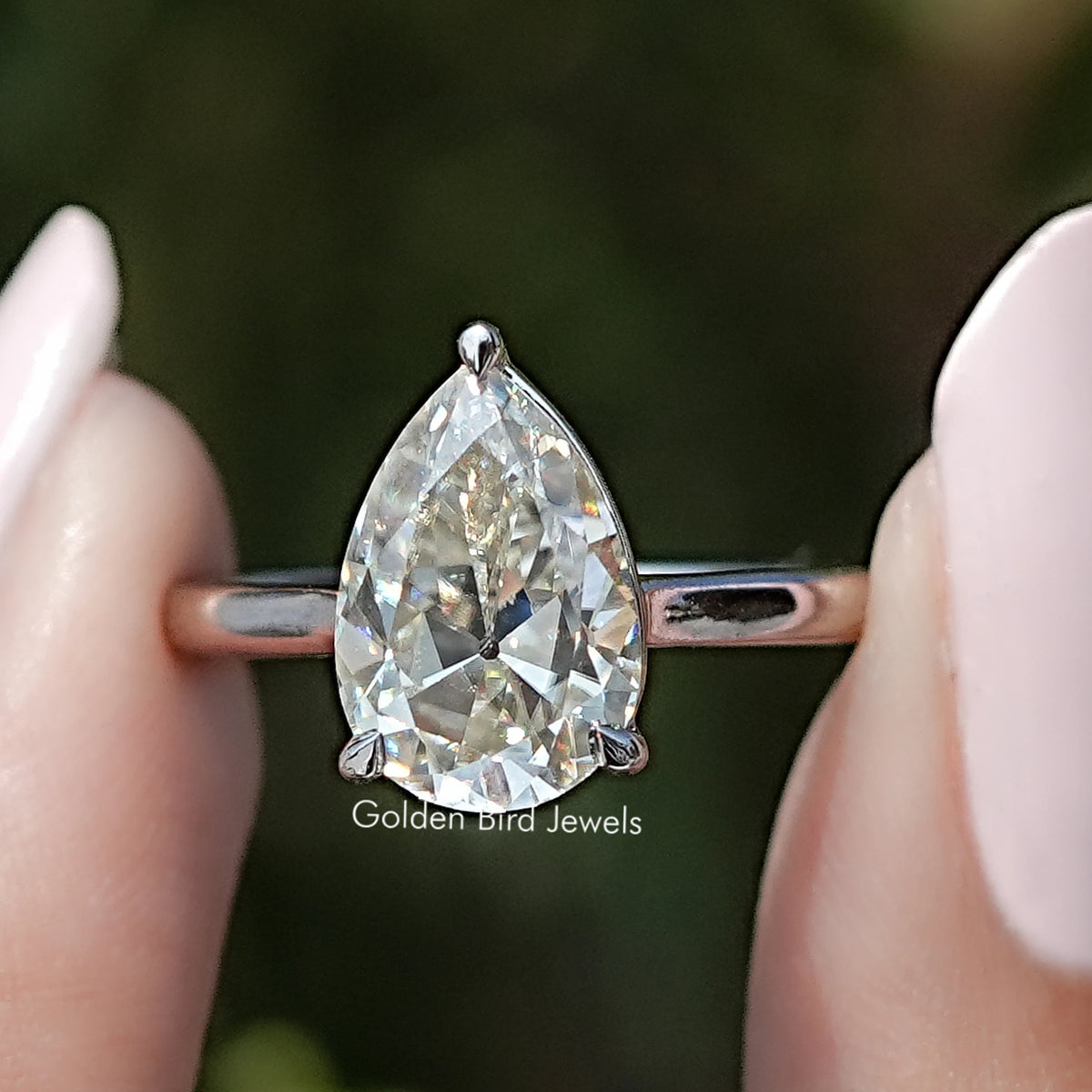 Front view of Old Mine Pear Moissanite Solitaire Ring