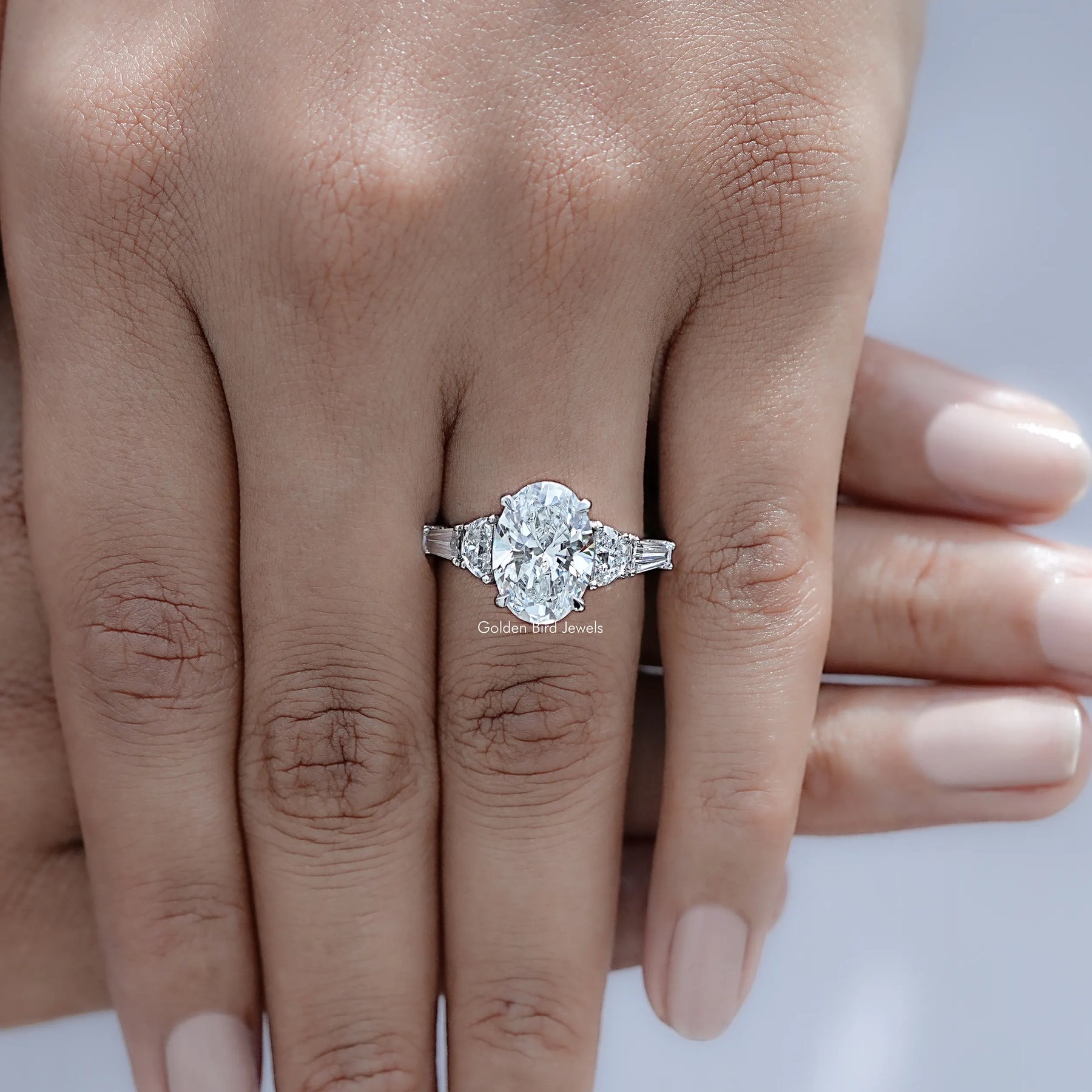 Top view of Oval And Half Moon Diamond Five Stone Ring