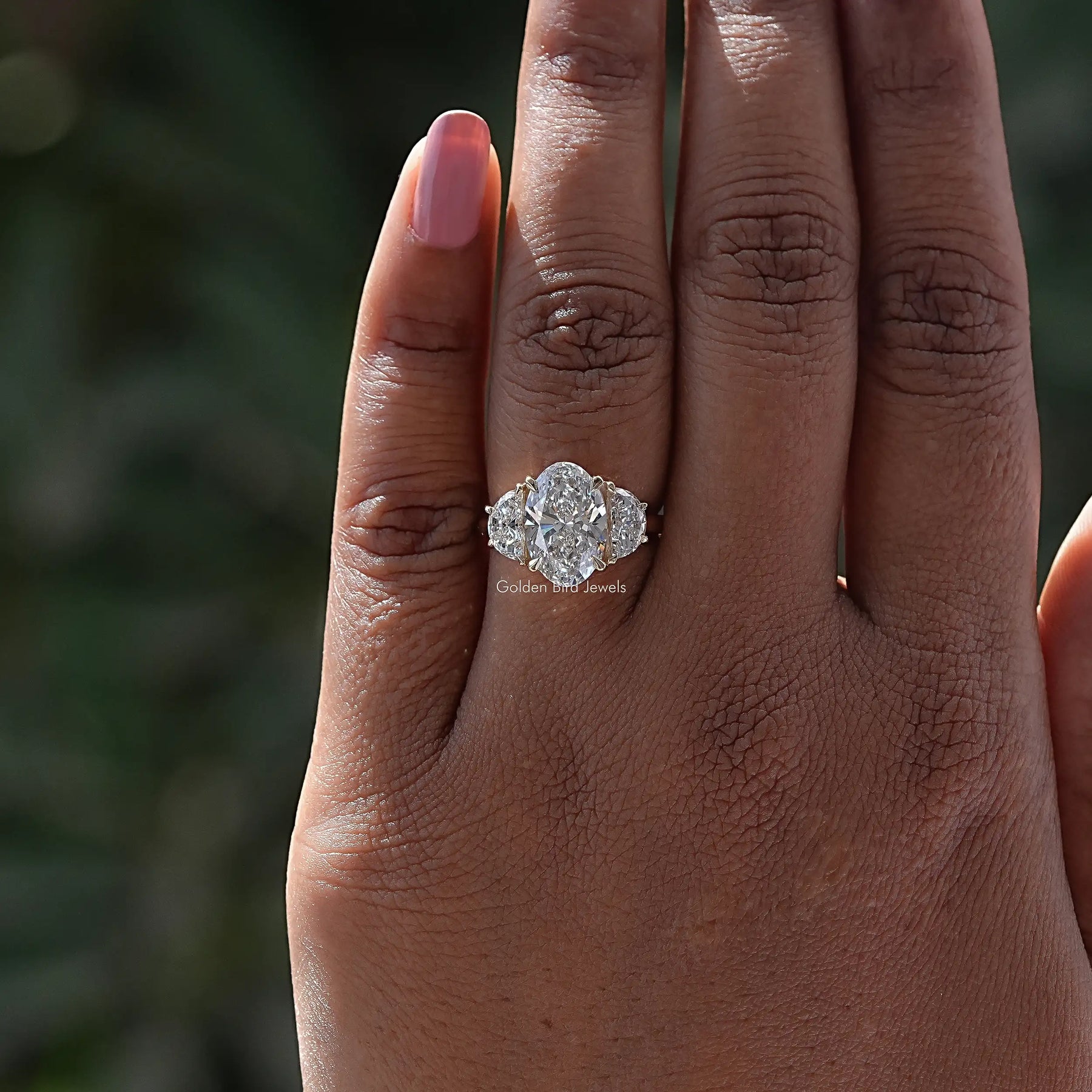 In finger view of Oval Cut Lab Diamond Halo Ring