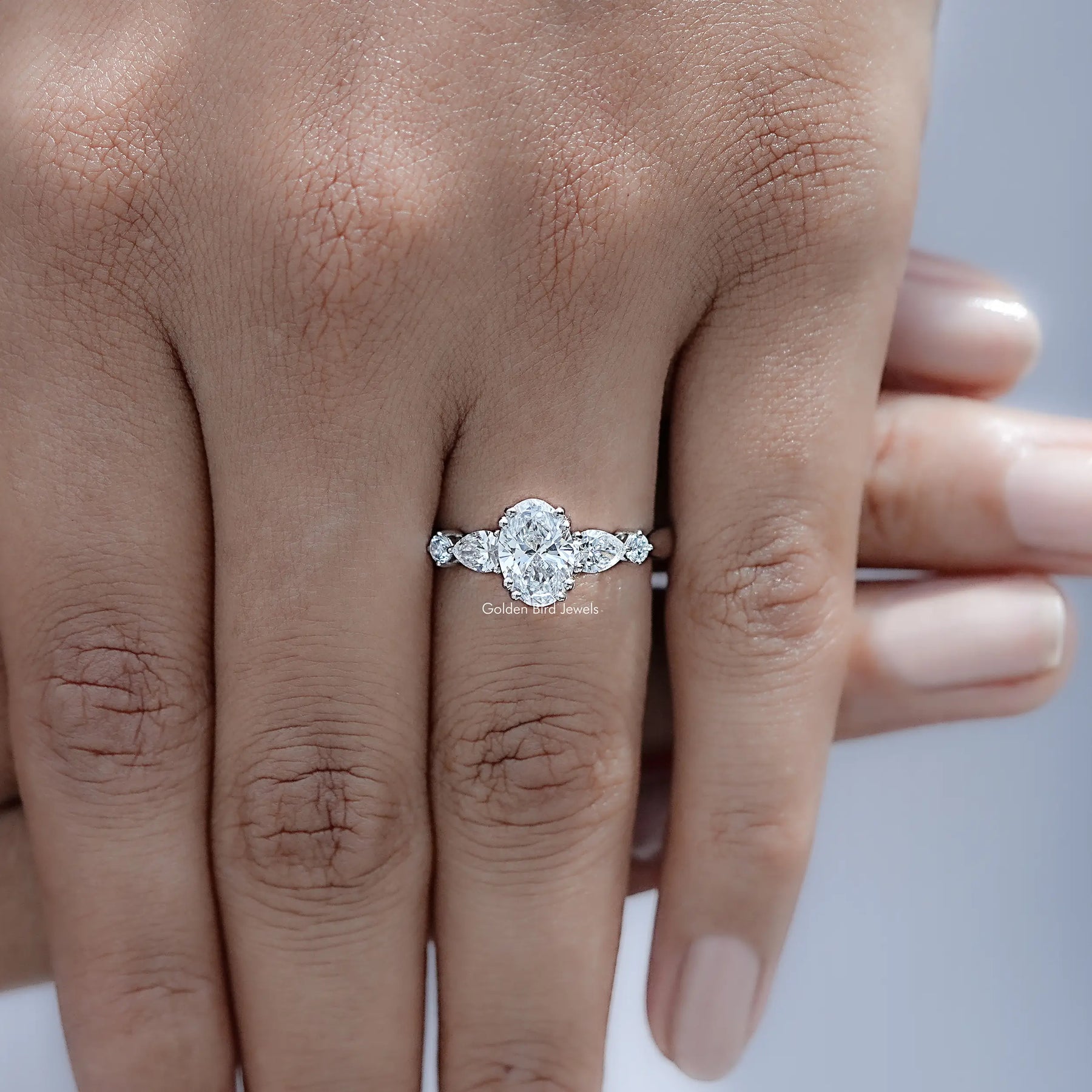 Top view of Oval And Half Moon Diamond Five Stone Ring