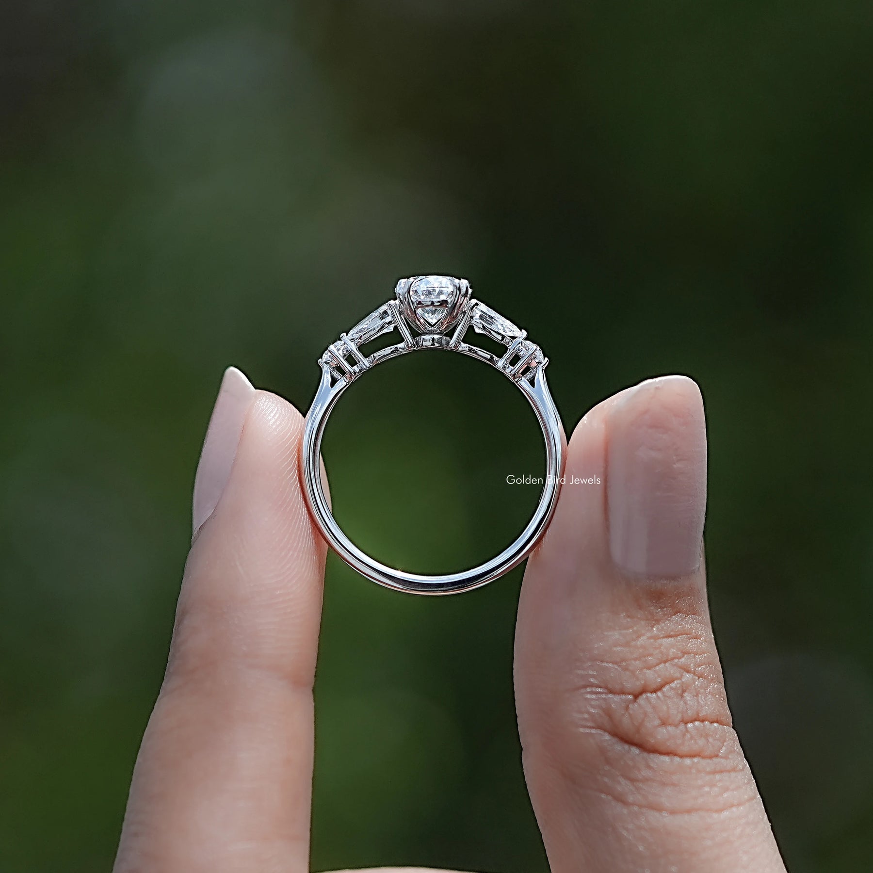 Back view of Oval And Pear Lab Diamond Five Stone Ring