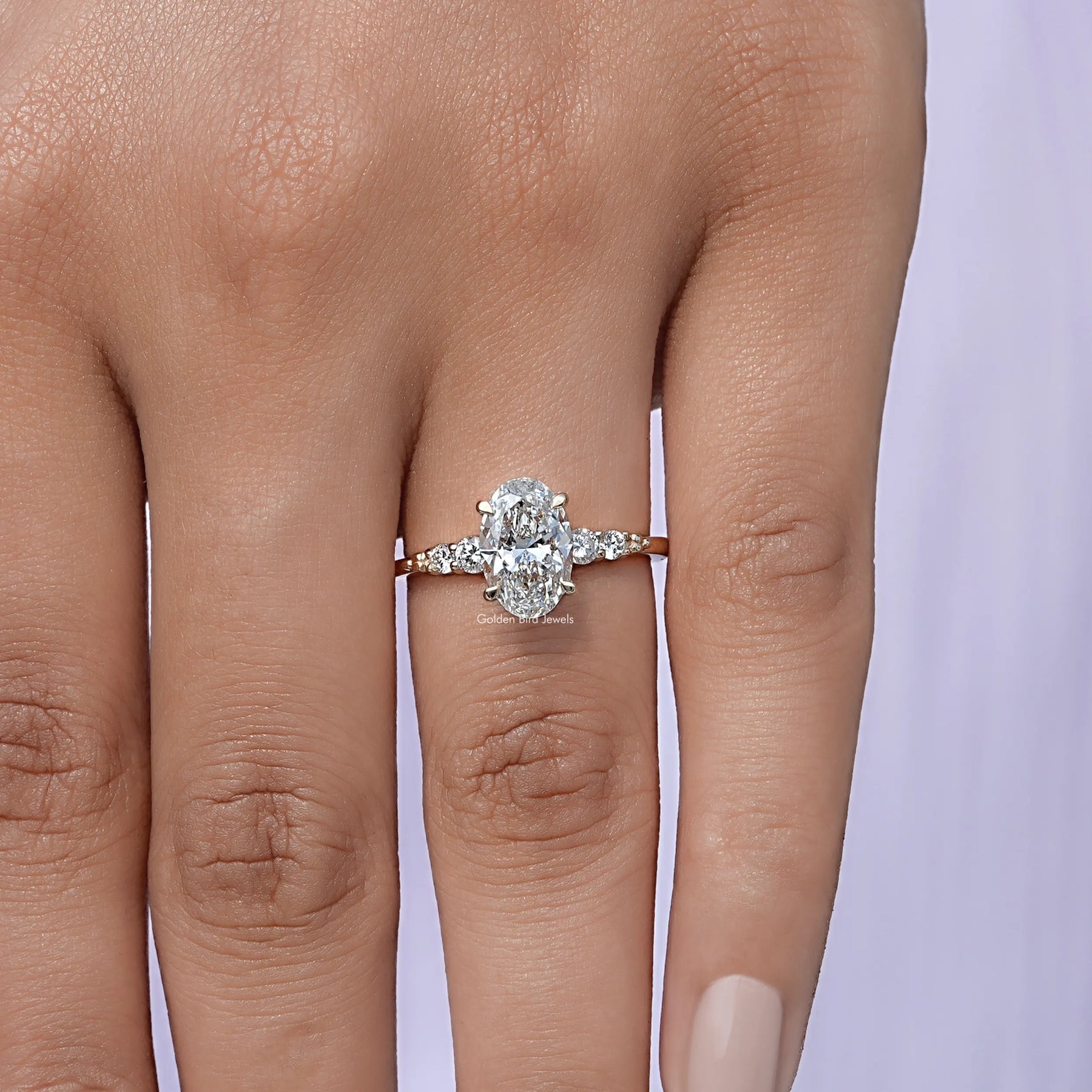 View of Oval And Round Cut Diamond Accent Ring In White Gold