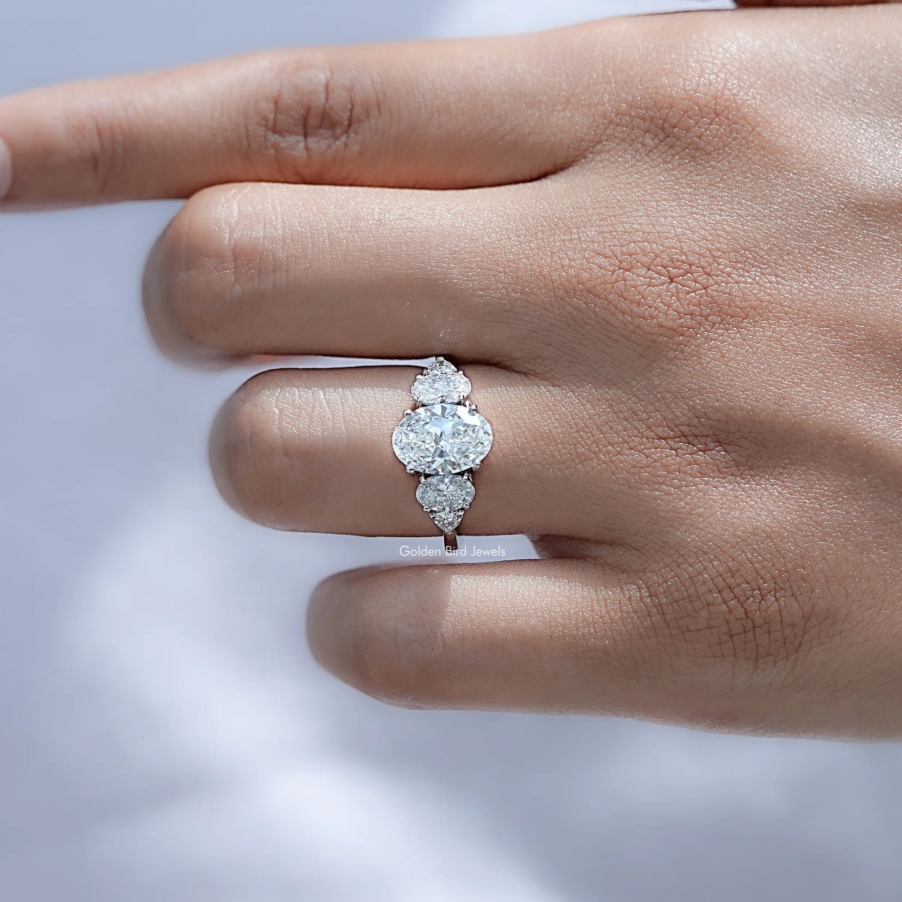 Detailed view of Oval And Trillion Lab Diamond Five Stone Ring
