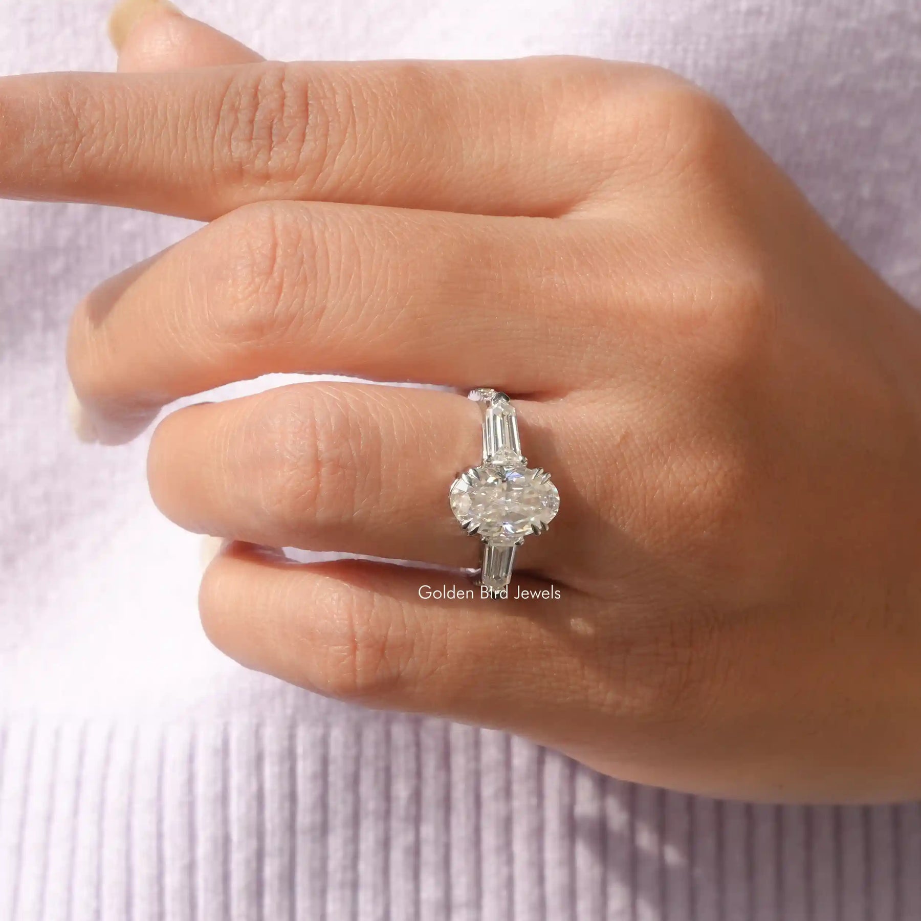 Close-Up View of Crushed Ice Oval Moissanite Accent Stone Ring In White Gold
