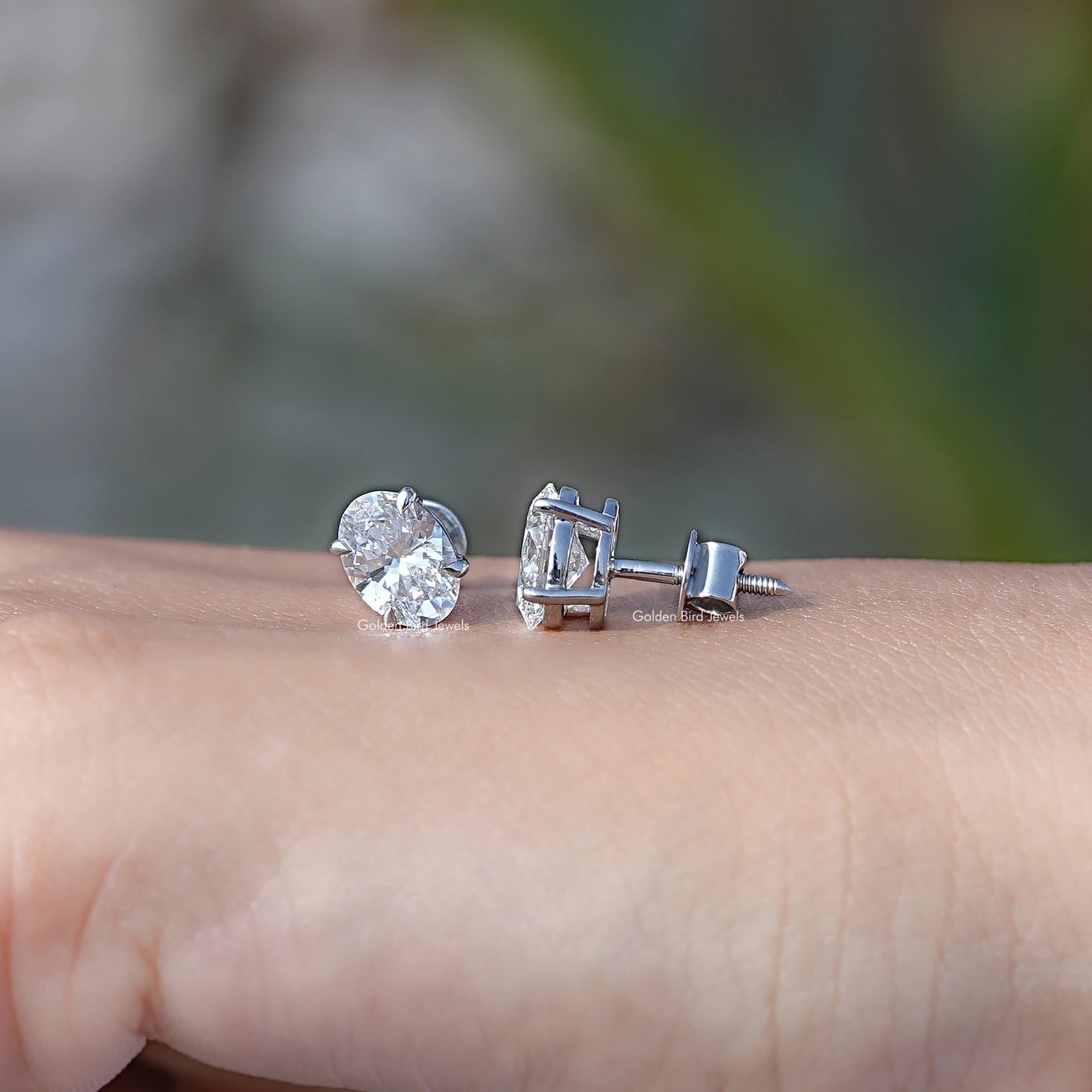 Front And Back Side View Of solitaire stud earrings crafted in lab diamonds
