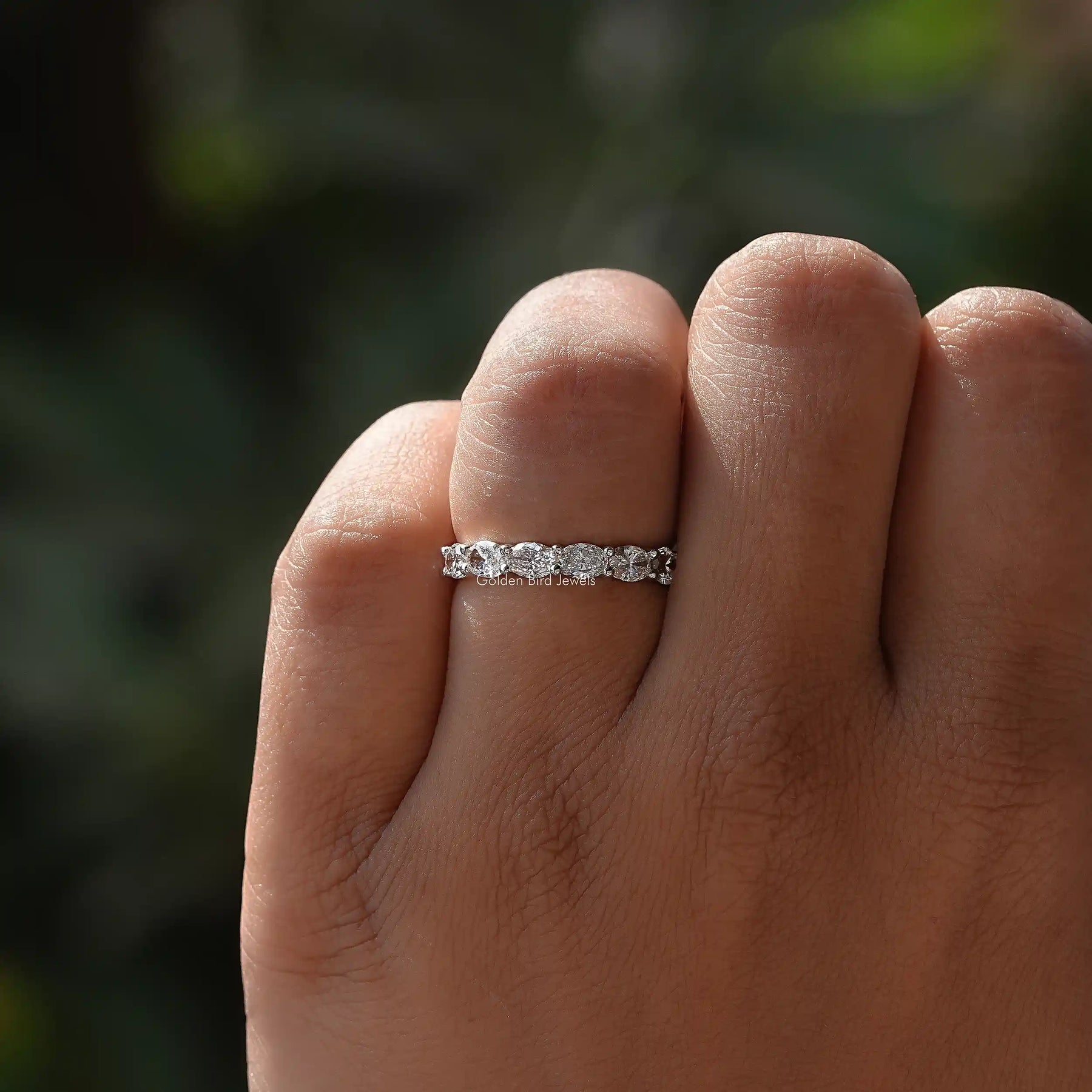 Close-Up View of Oval Cut Lab Diamond Eternity Band In White Gold