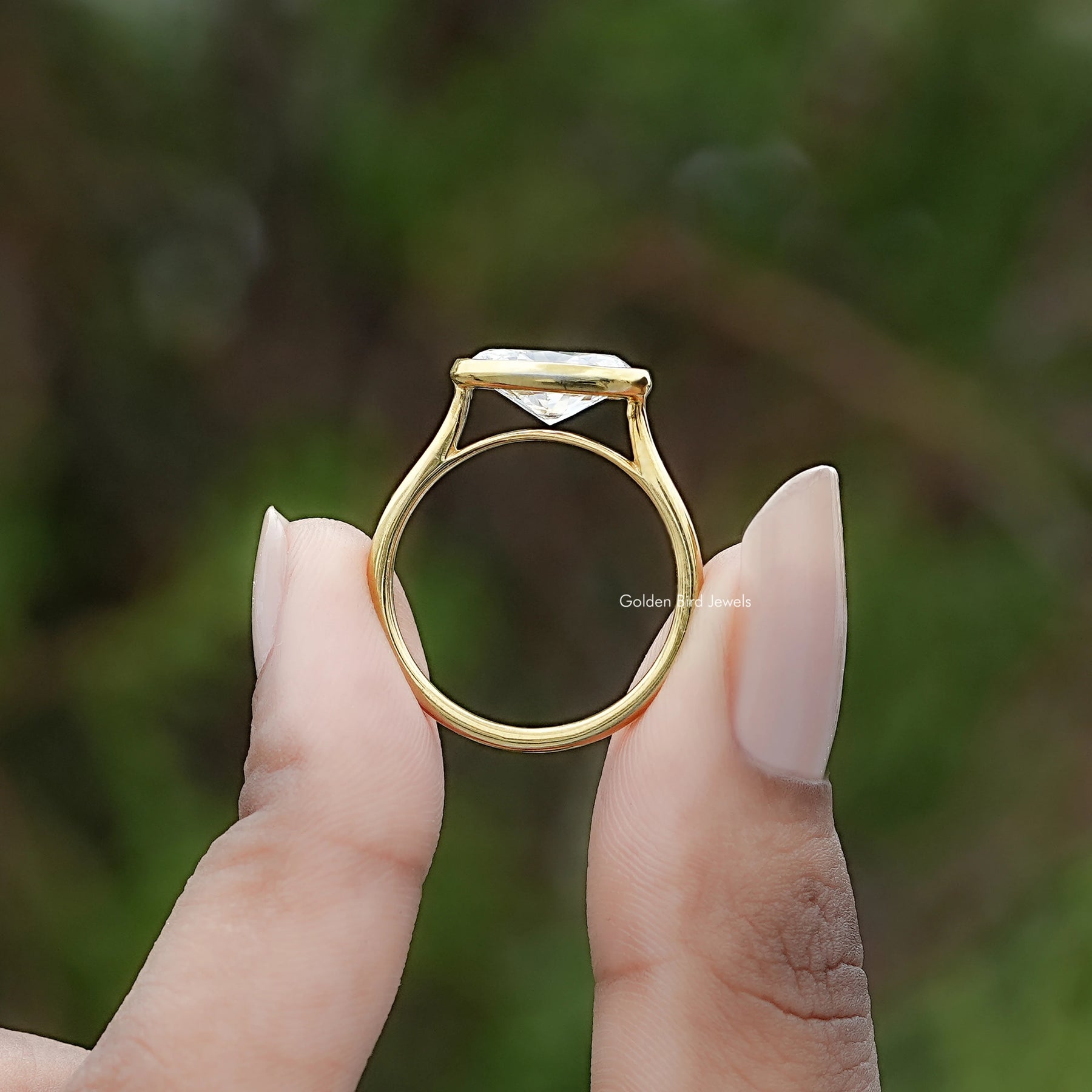 Back view of East West Oval Cut Lab Diamond Bezel Set Ring