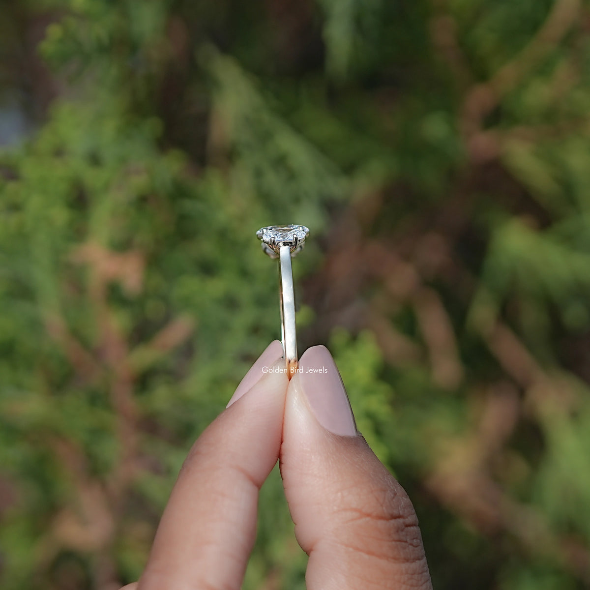 Side View of Oval Cut Lab Diamond Three Stone Ring