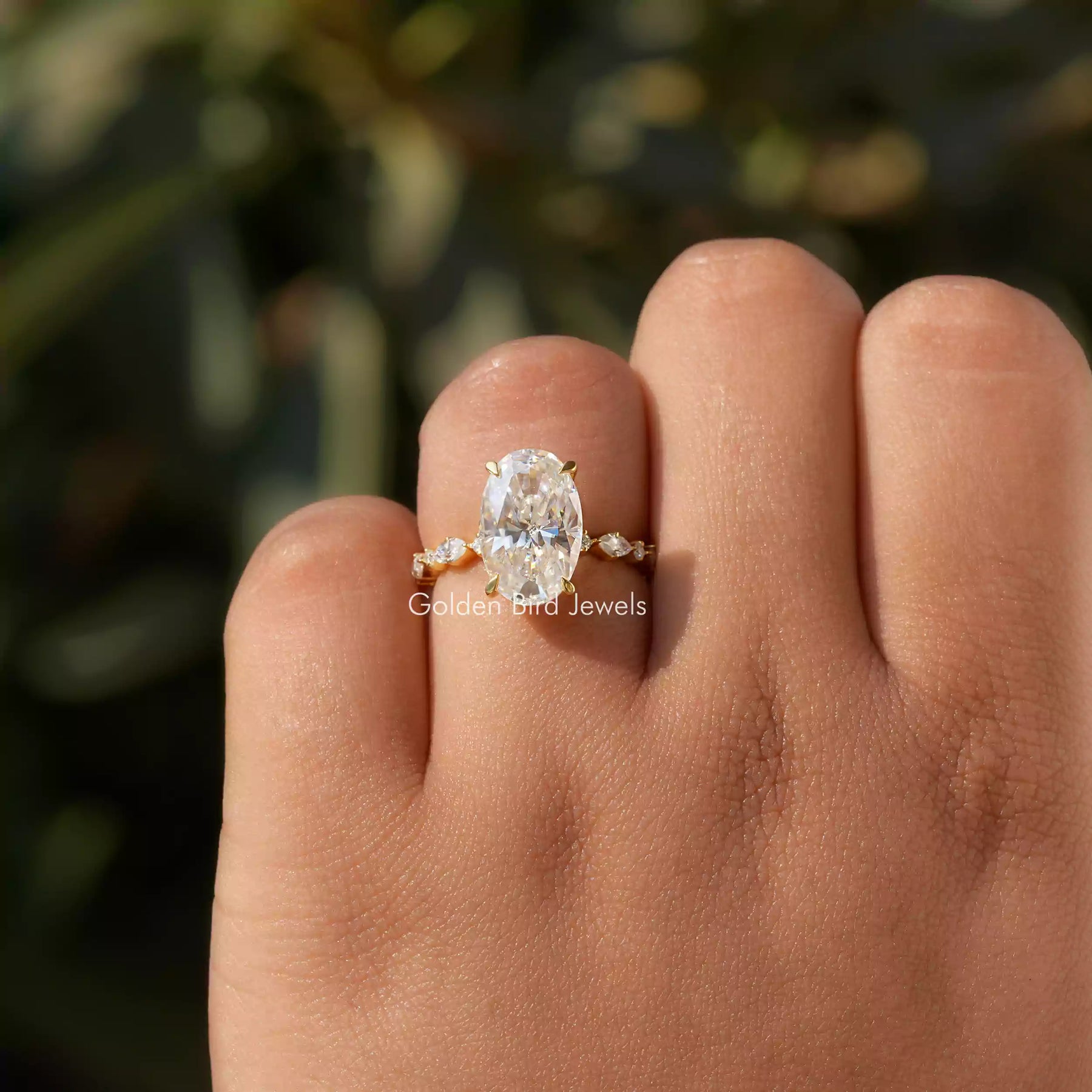 View of Oval Cut Moissanite Accent Ring In finger