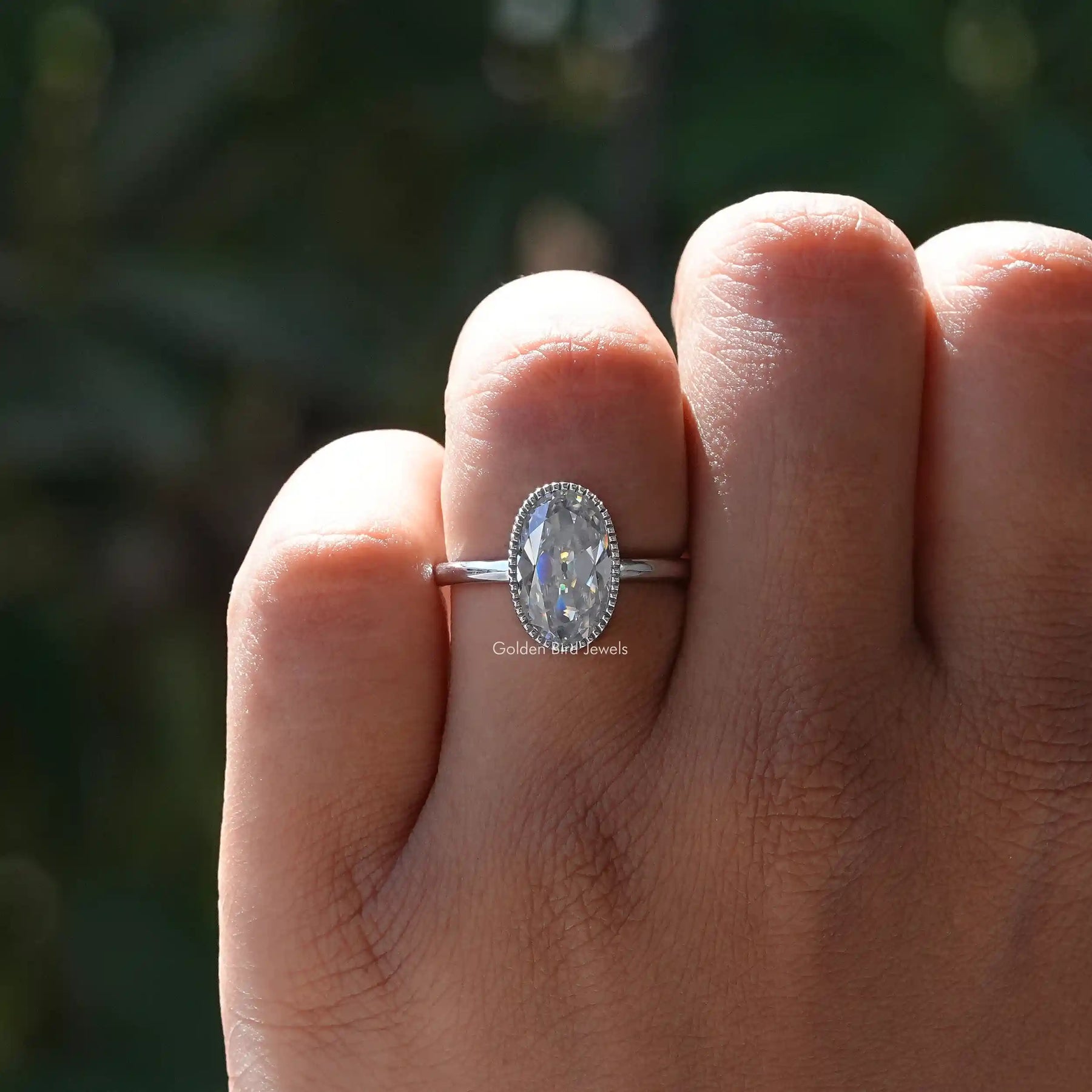 Moissanite Old Mine Oval Cut Solitaire Ring In finger