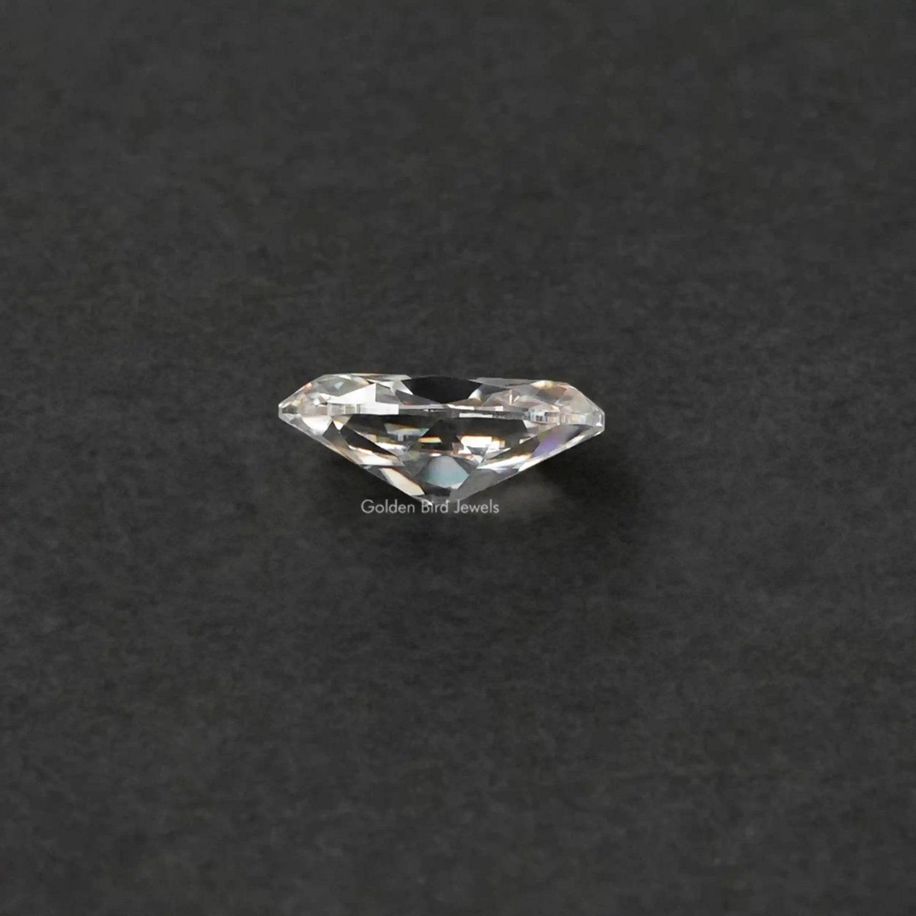 Side View Of Near Colorless Oval Shaped Loose Stone