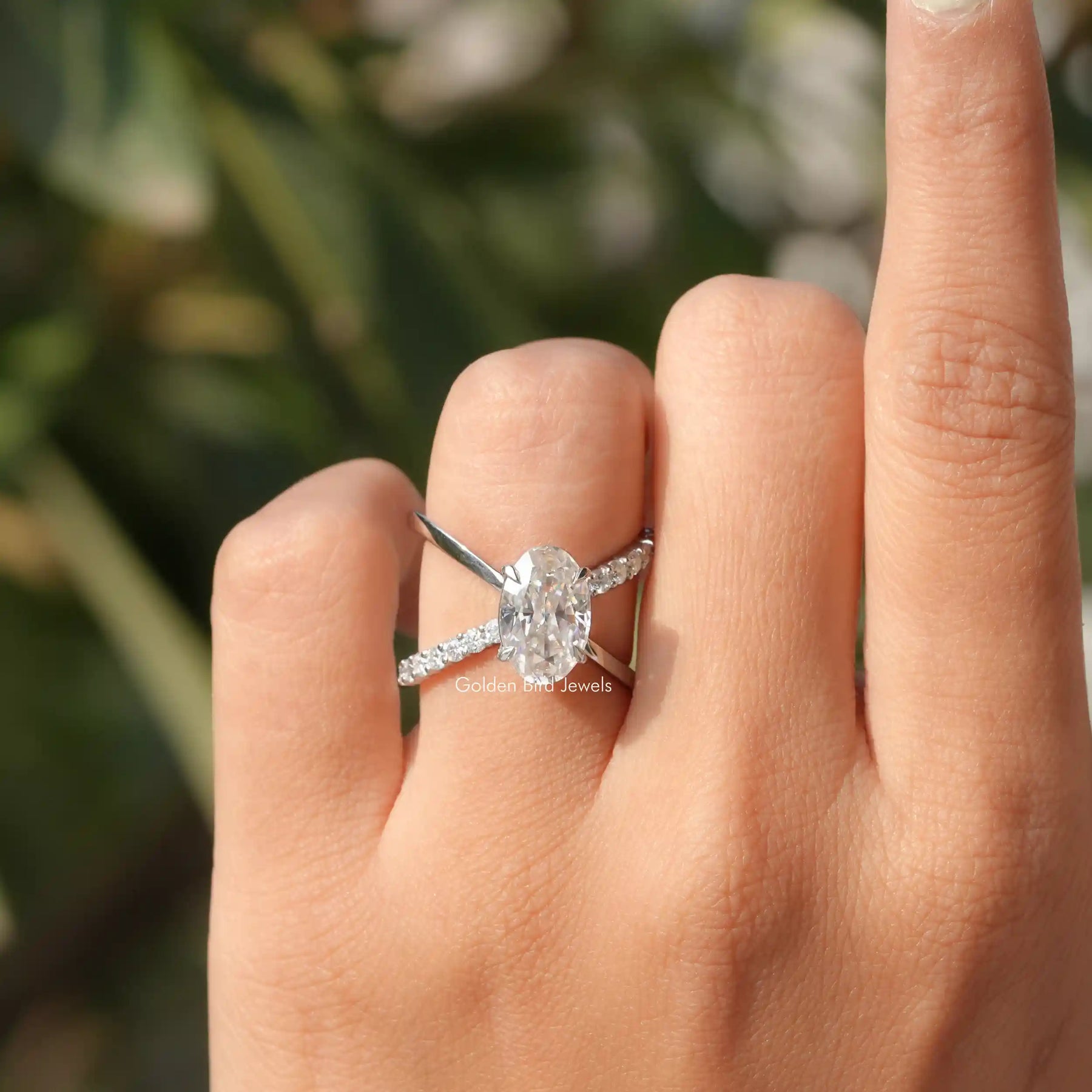 View of Split Shank Oval Cut Moissanite Engagement Ring In White Gold