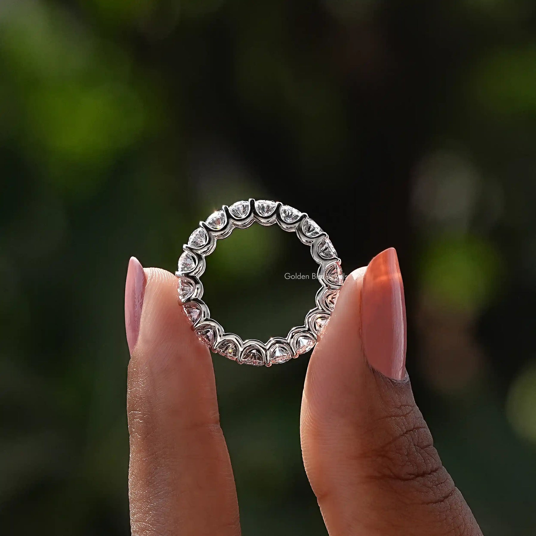 Back View of Oval Cut Diamond Eternity Wedding Band In two fingers