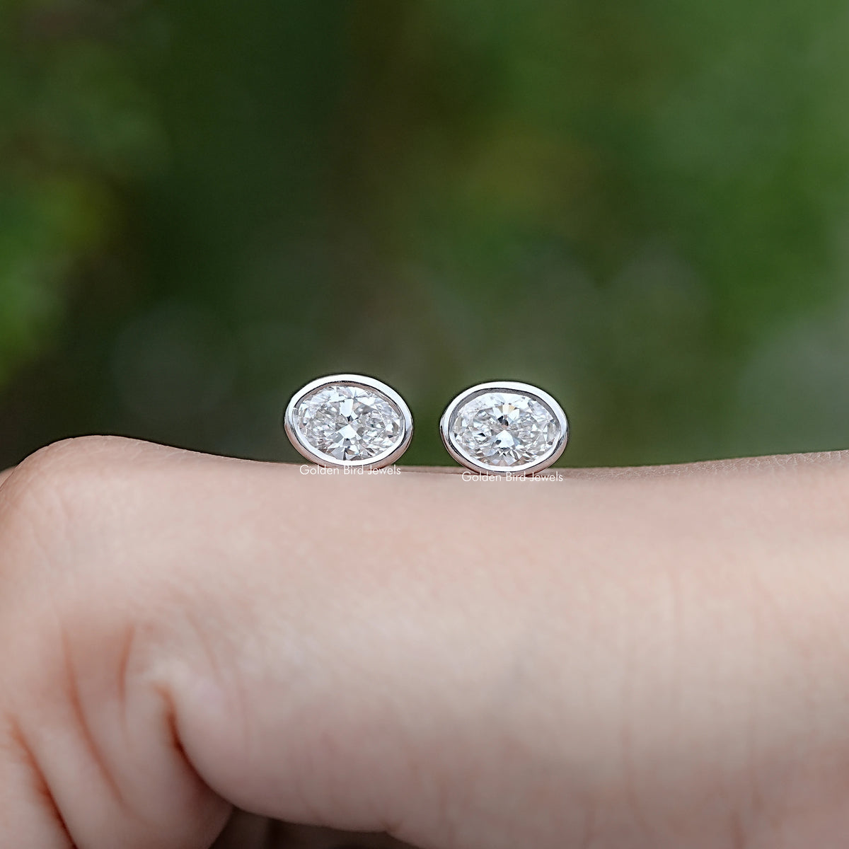 Front view of Lab Diamond Bezel Set Oval Bezel Set Oval Earrings