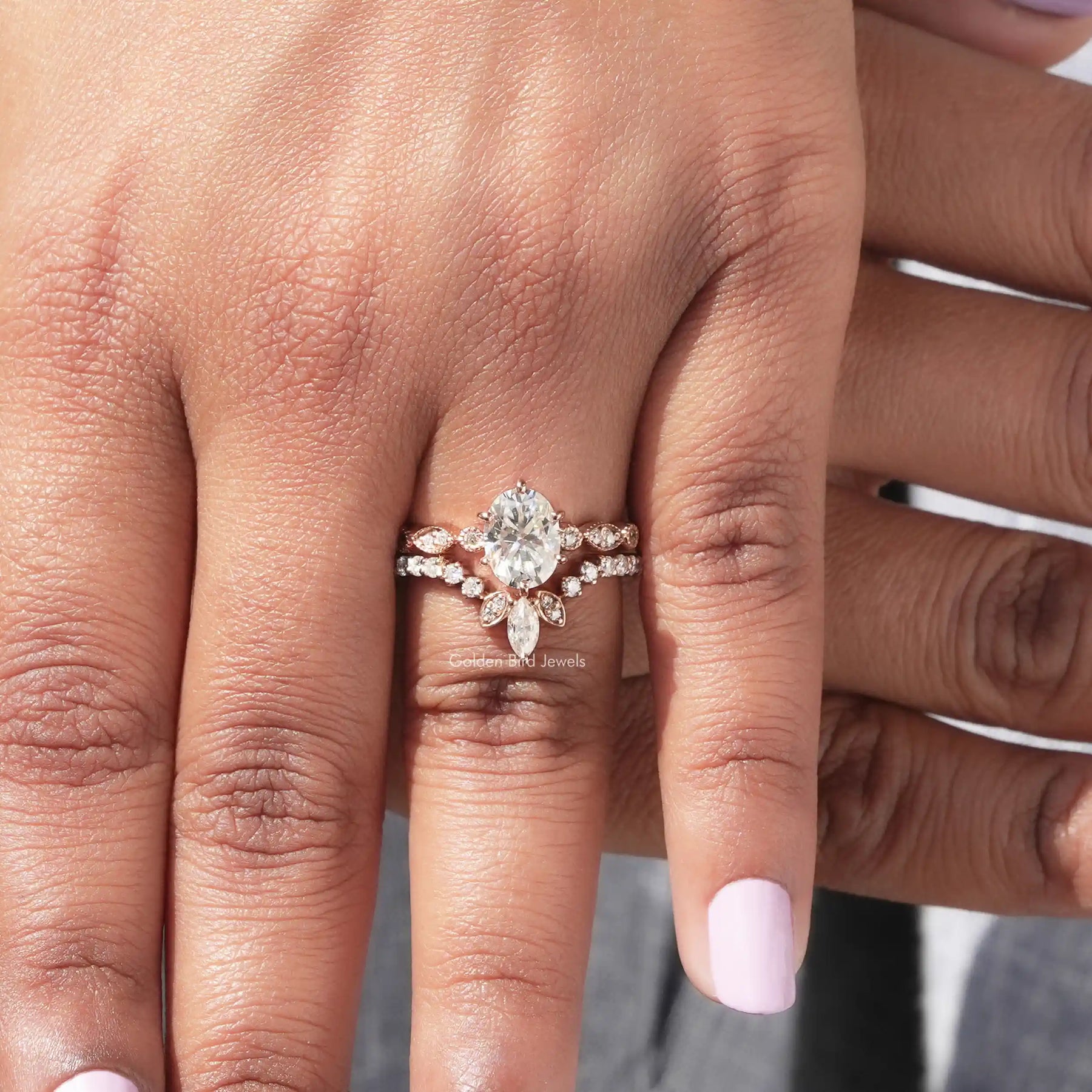 Detailed View Of Marquise And Oval Cut Moissanite Bridal Ring Set In Yellow Gold