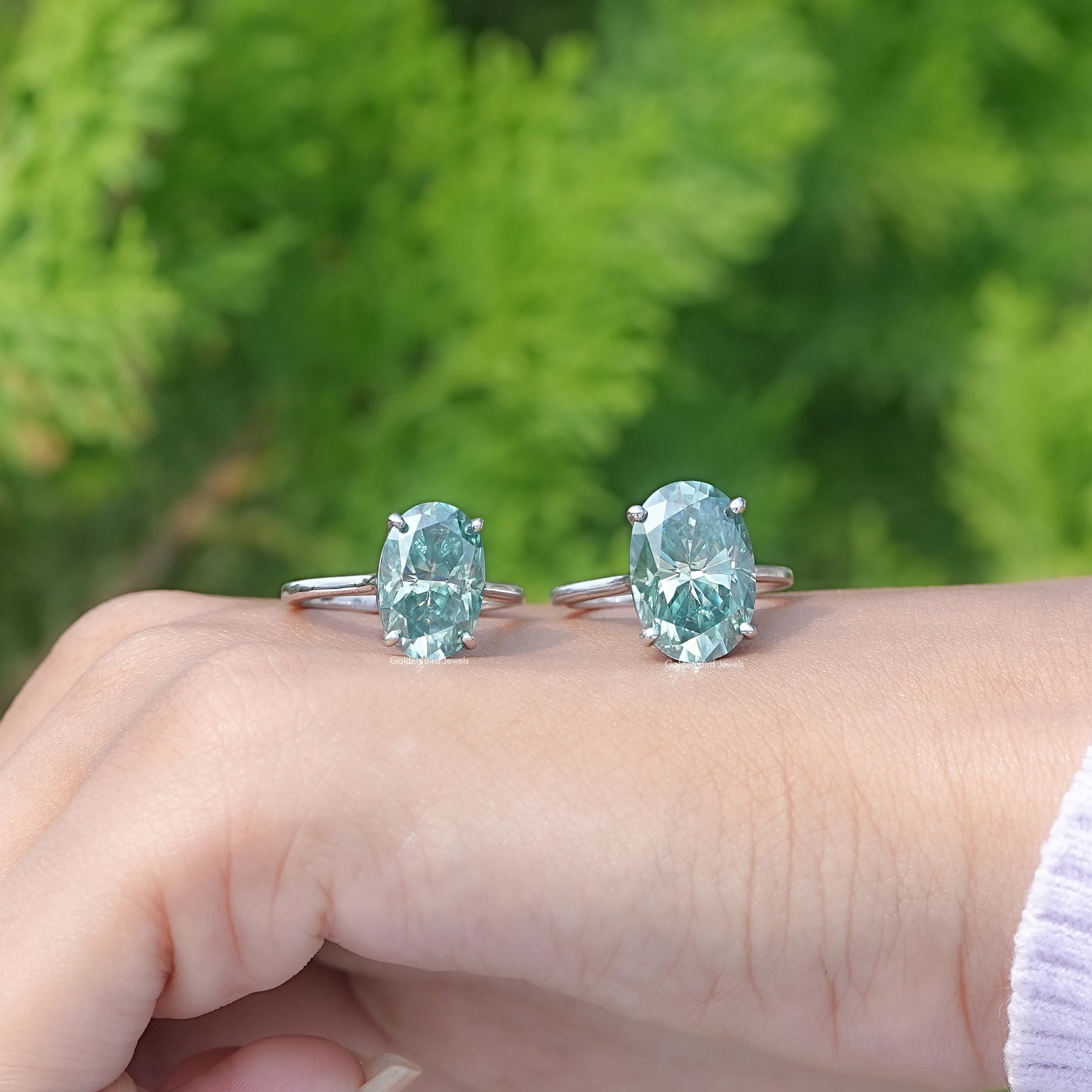 Front View of Oval Cut Moissanite Solitaire Ring In White Gold