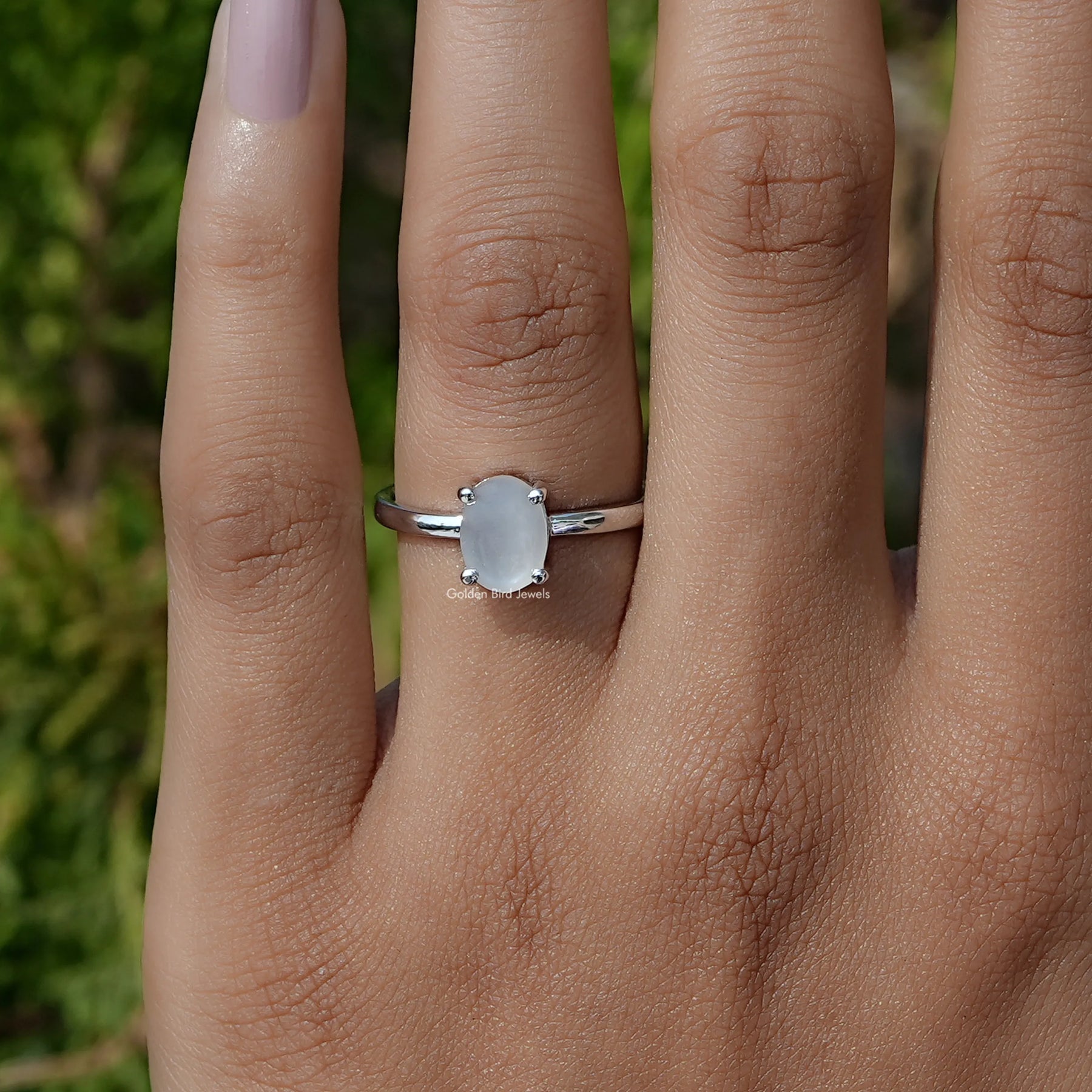 In Finger front view of Oval Moonstone Gemstone Engagement Ring In White Gold