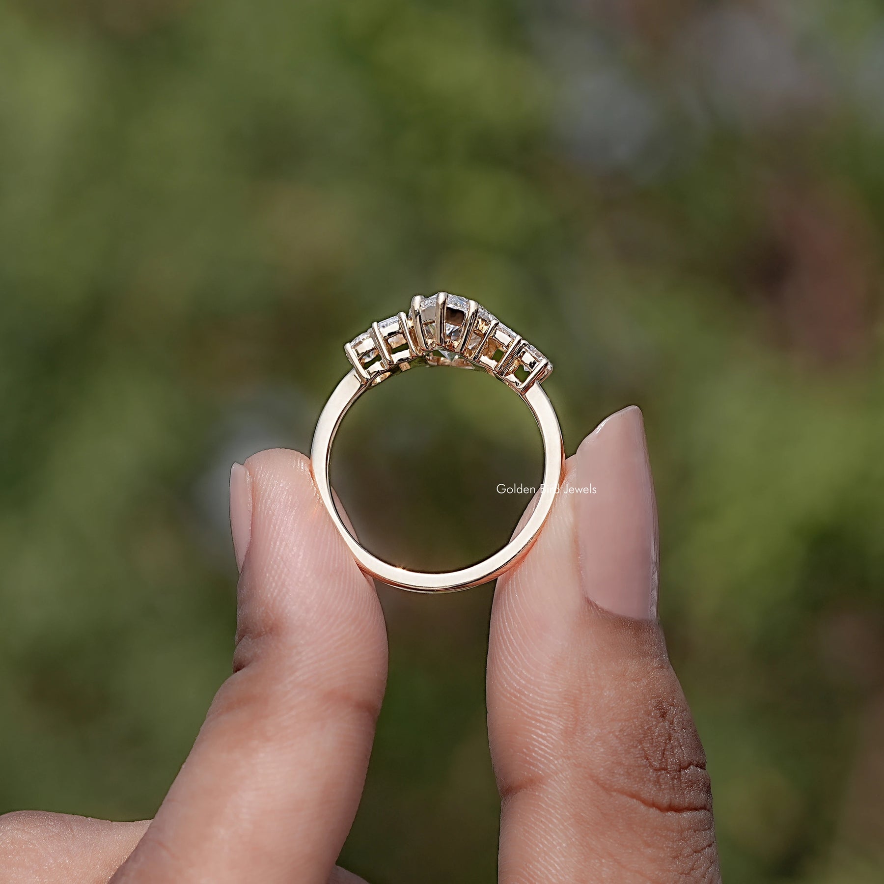Back view of Pear And Baguette Cut Lab Diamond Five Stone Ring