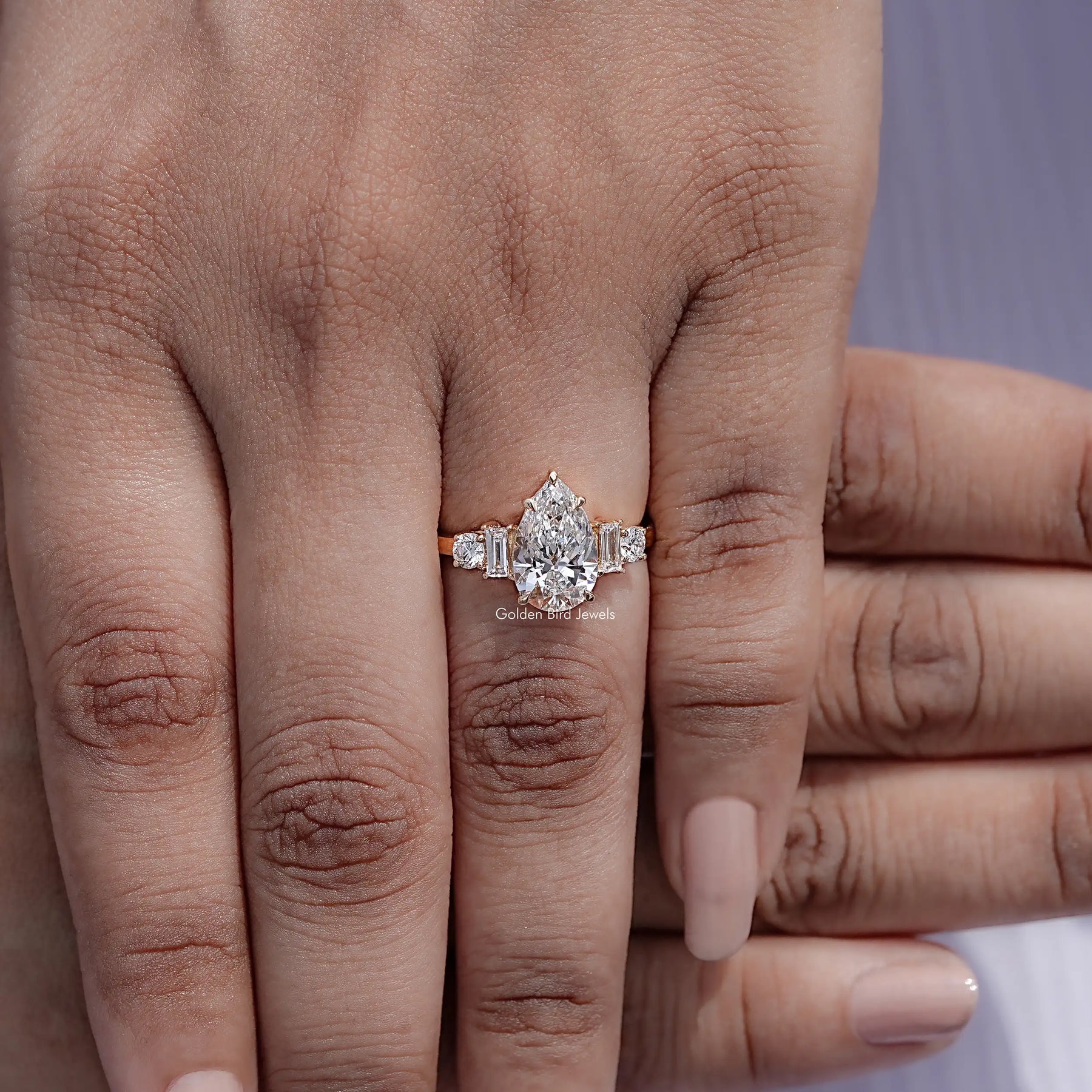 Display view of Pear And Baguette Cut Lab Diamond Five Stone Ring