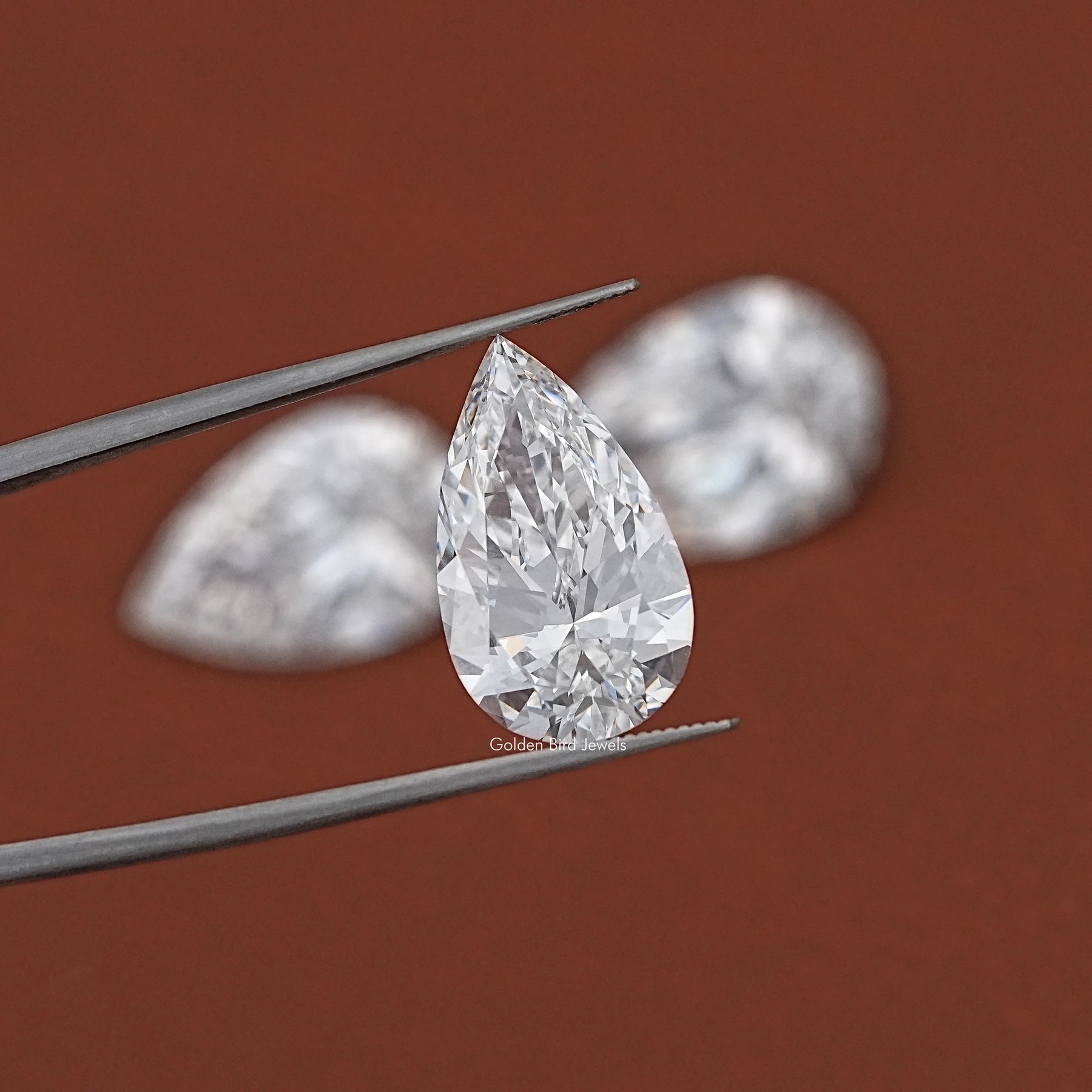 In Tweezer View Of IGI Certified Pear Cut Loose Lab Diamond