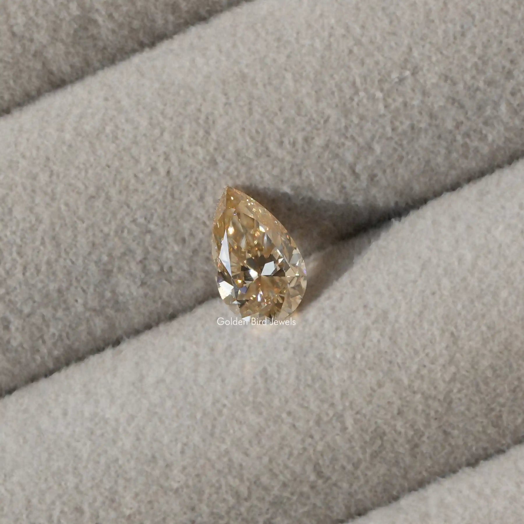 View of Champagne Old Mine Pear Shaped Diamond