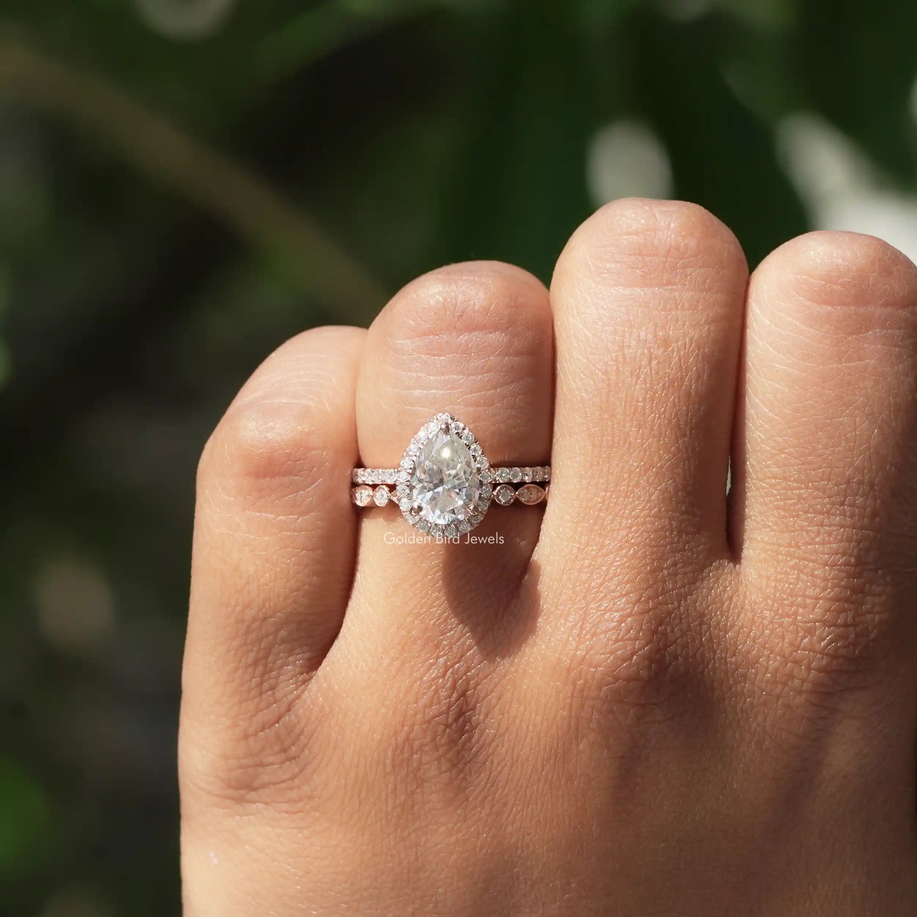 Pear Cut Moissanite Bridal Ring Set In finger