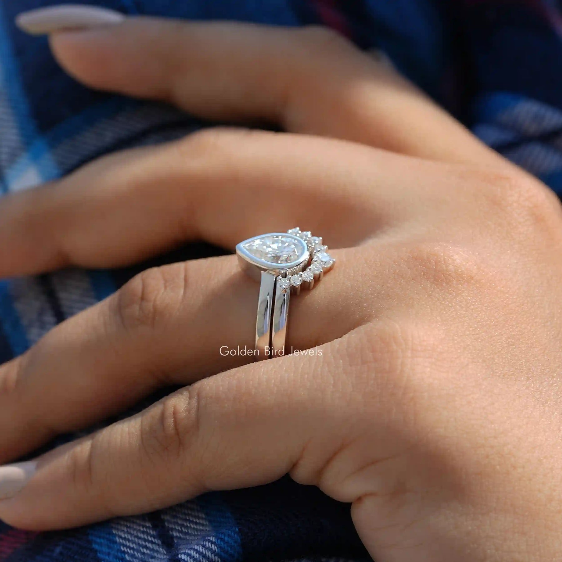 View of Pear Cut Moissanite Bridal Ring In Finger