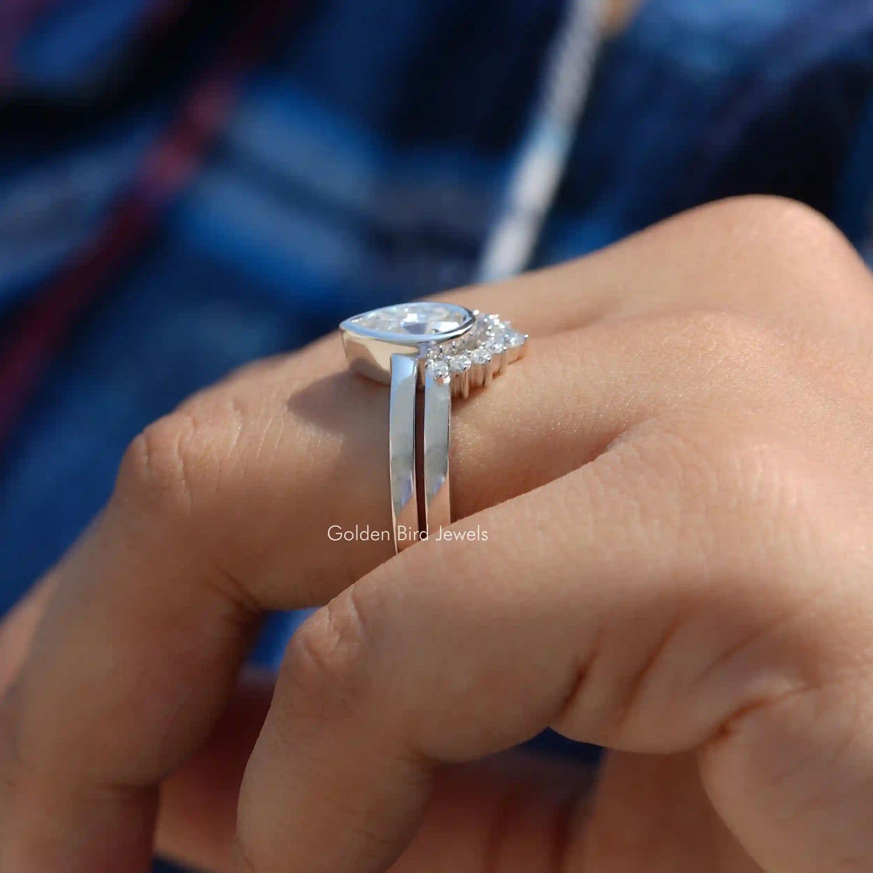 Side View of Moissanite Engagement Ring Set In finger
