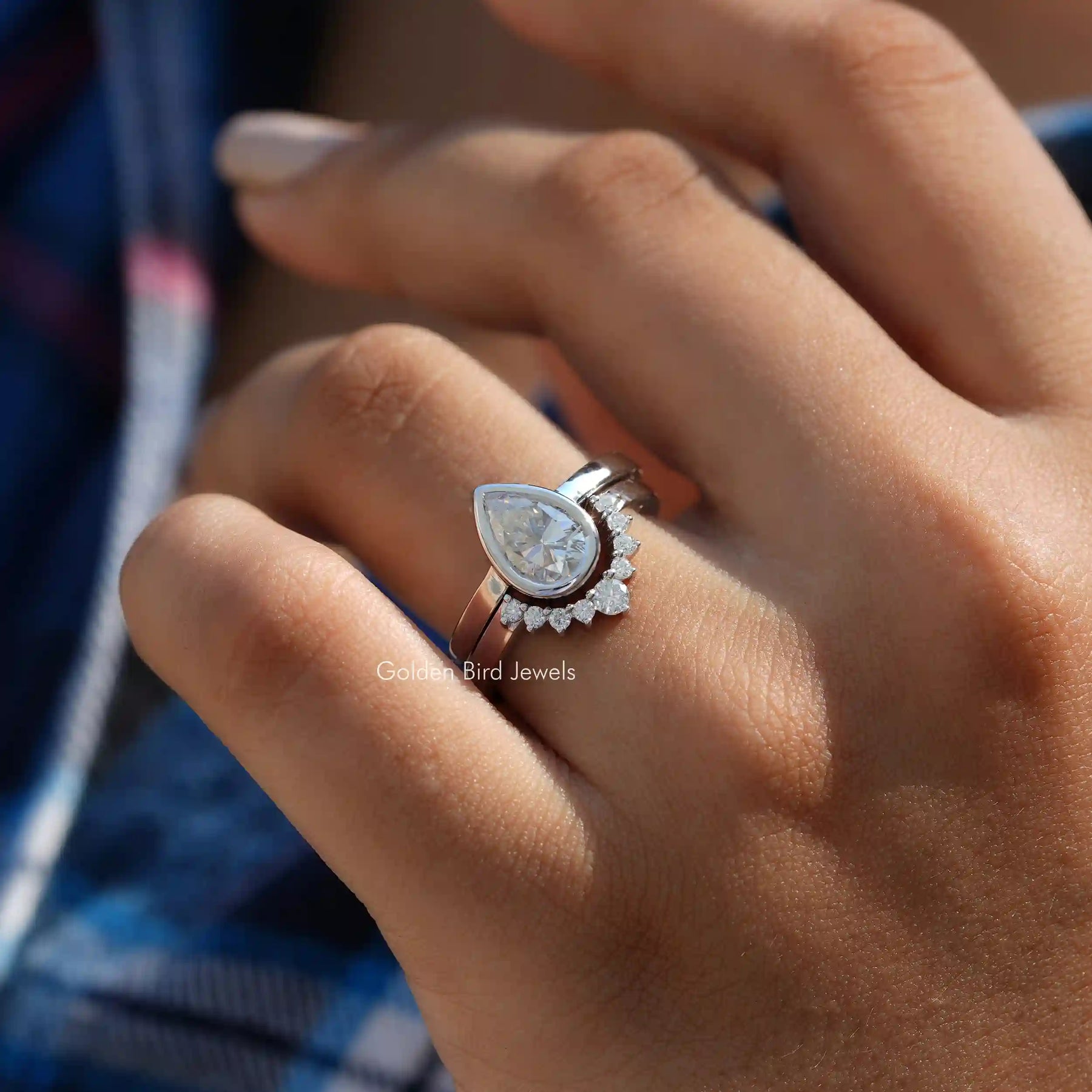 View of Pear Cut Moissanite Bridal Ring Set In Finger