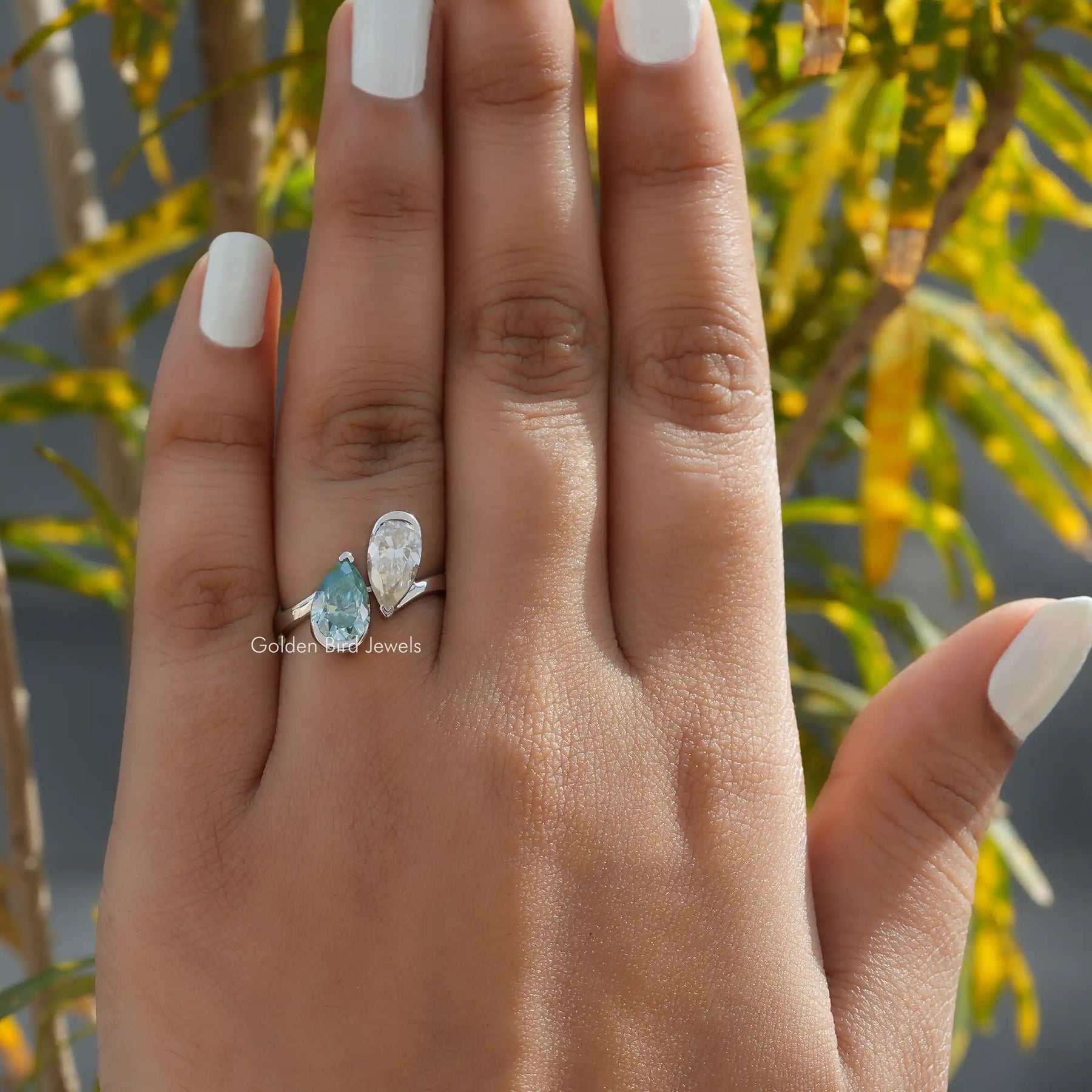 In finger view of Moissanite toi-et-moi ring