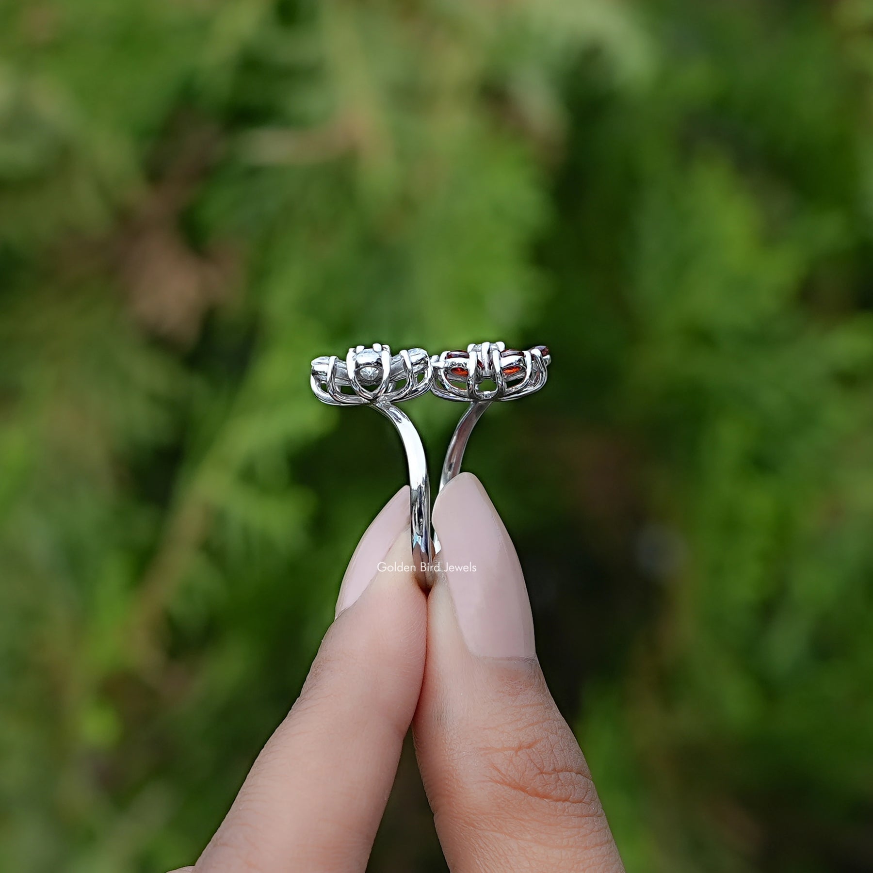 Side View of Pear Gemstone Flower Shape Cluster Bypass Ring In two fingers