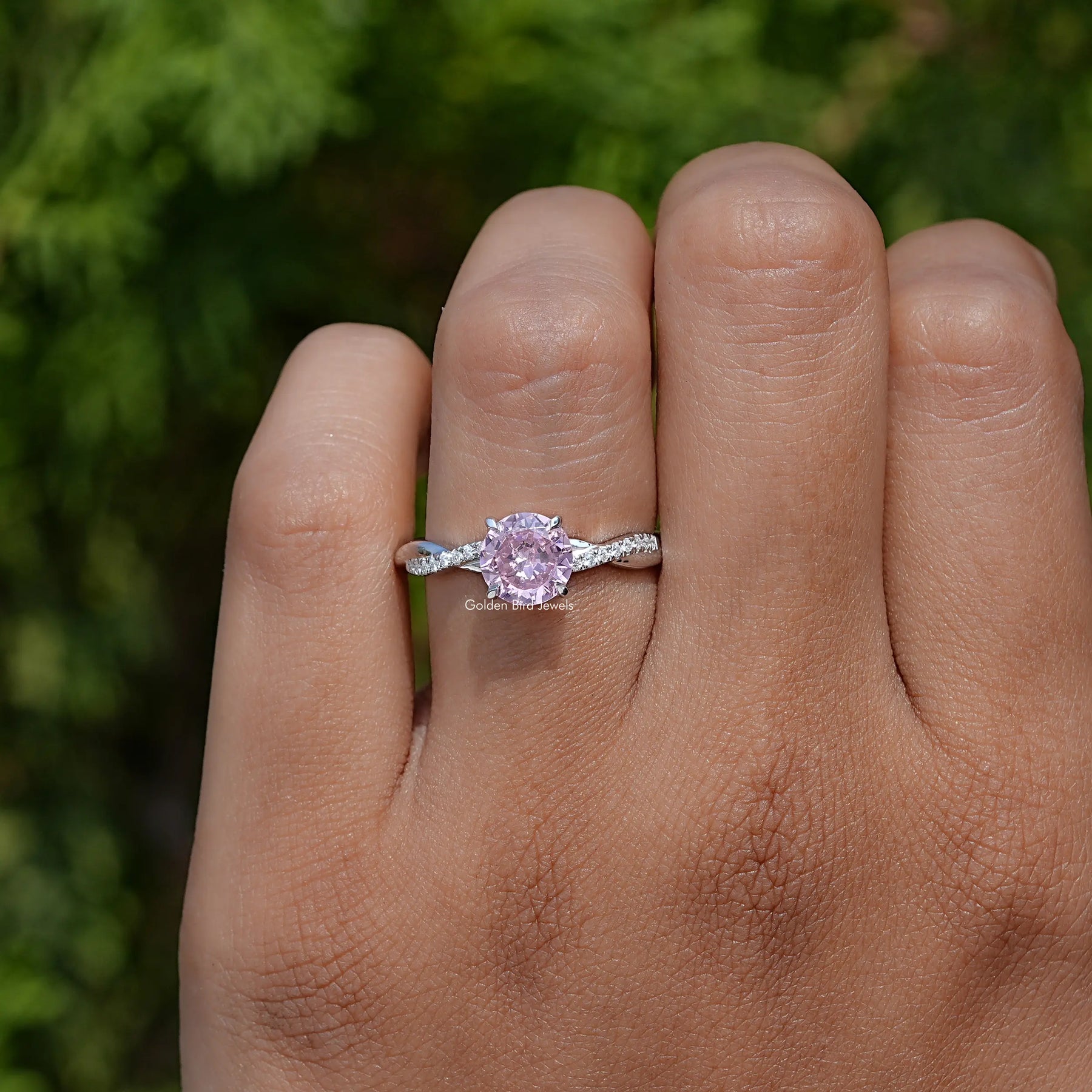 Close-Up View of Round Cut Gemstone Accent Ring In Yellow Gold