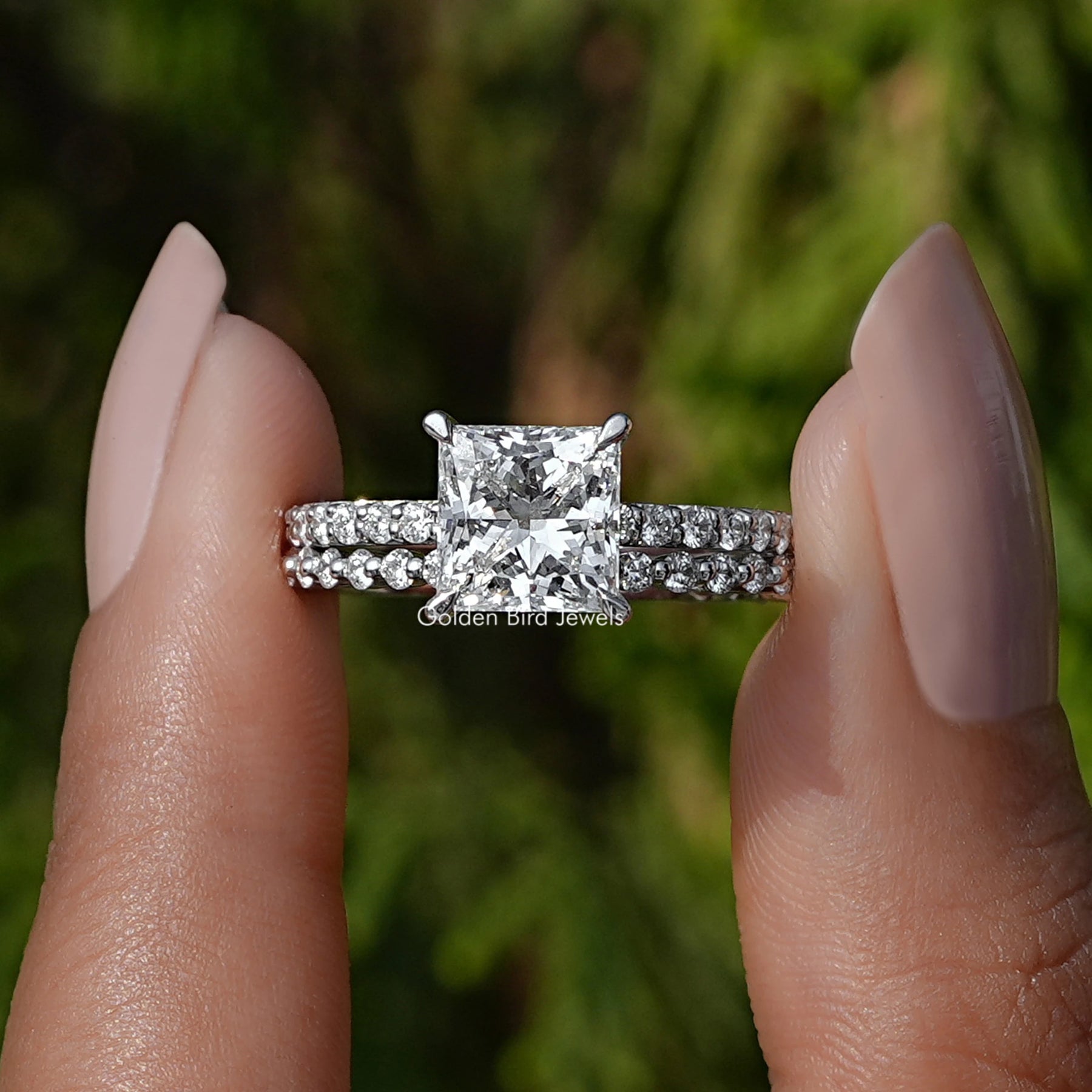Front View A Princess Cut Lab Grown Diamond Ring in a two fingers