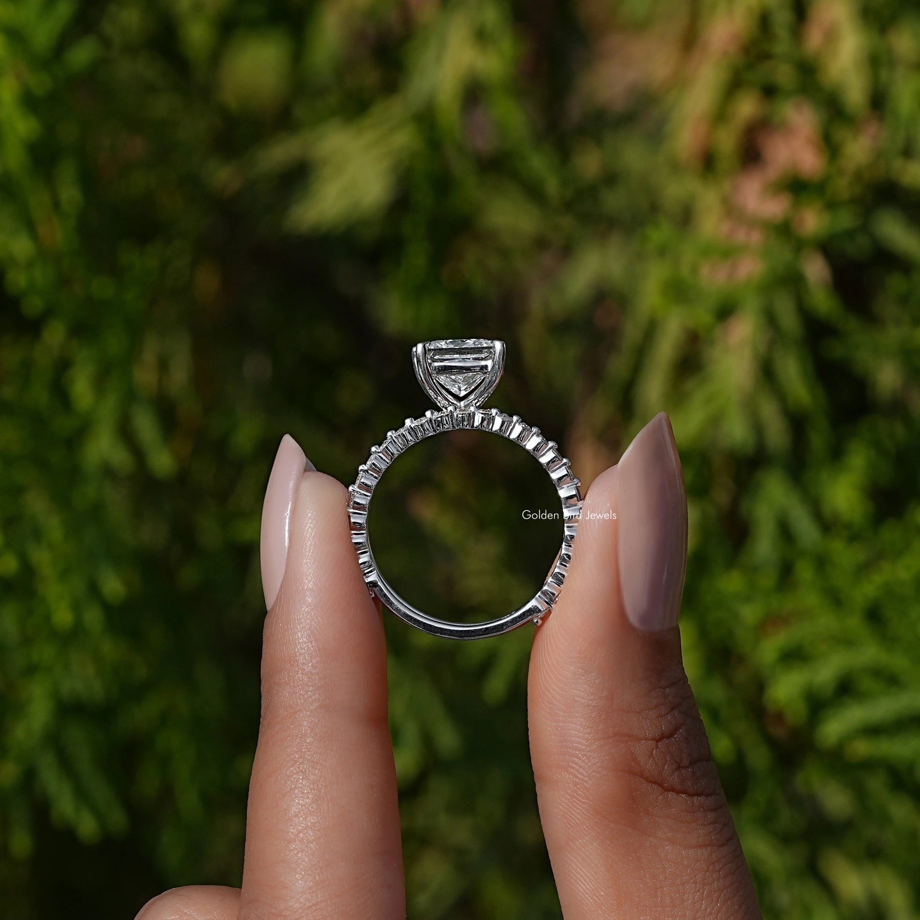 Back View A Princess Cut Lab Grown Diamond Ring In a two fingers