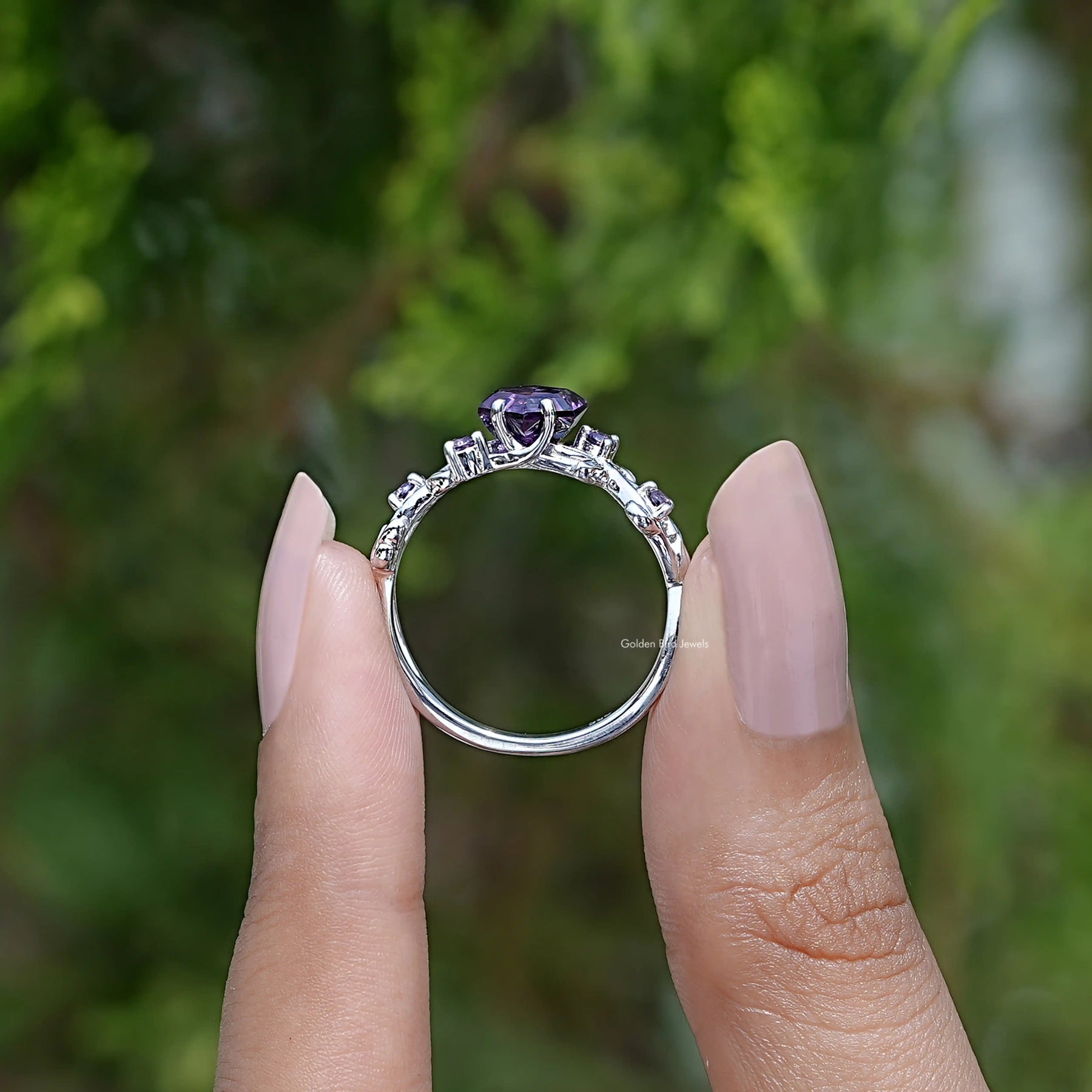 Back View of Purple Amethyst Hexagon Cut Ring in two fingers