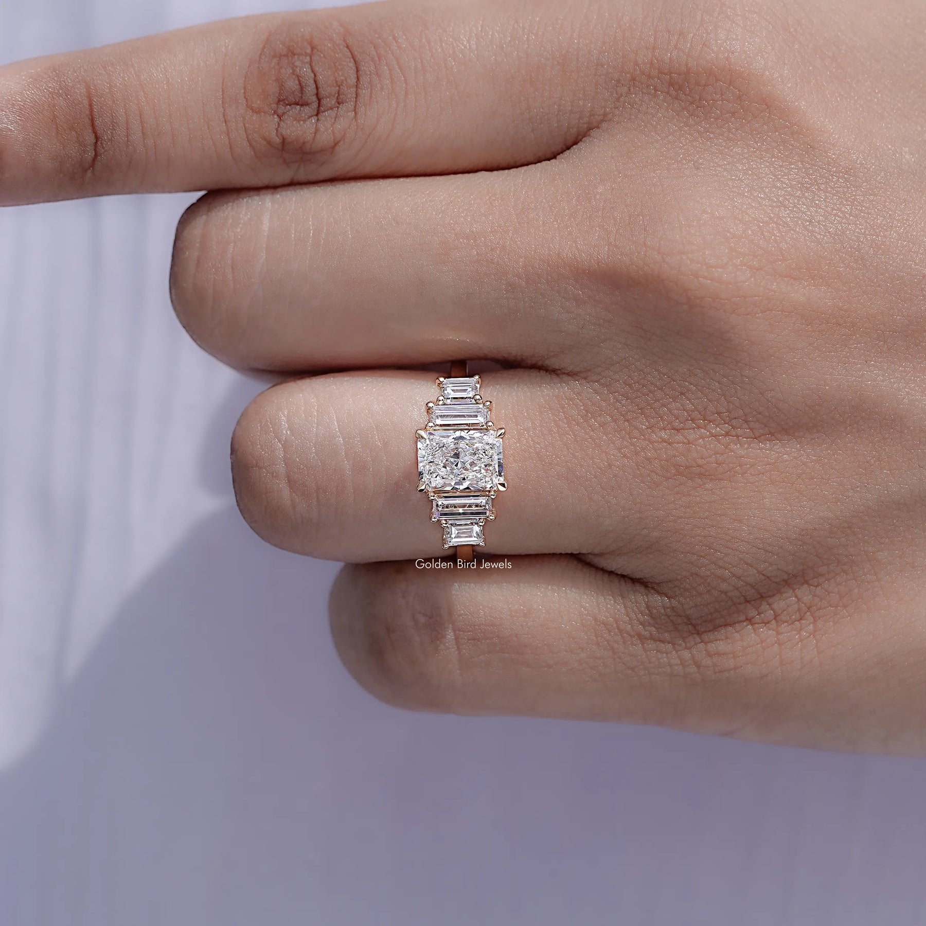 Display view of Radiant And Baguette Diamond Multi Diamond Ring