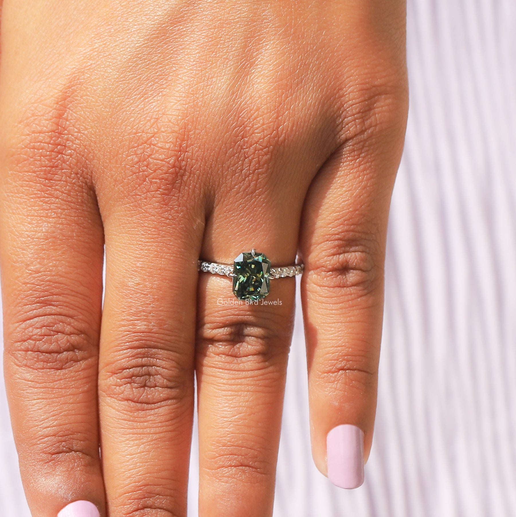 View of Round And Radiant Cut Moissanite Engagement Ring In finger