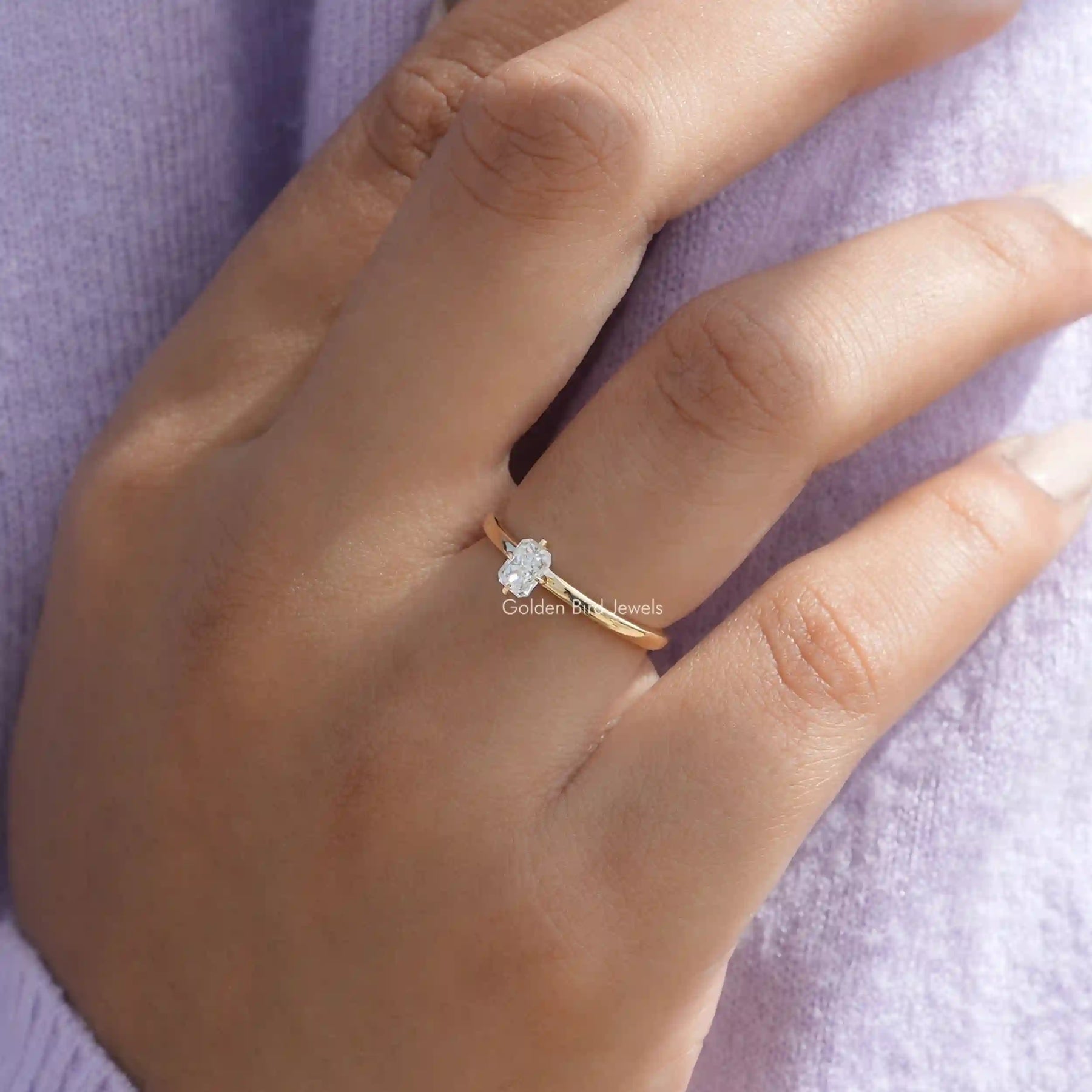Close-Up View of Radiant Cut Lab-Grown Praposal Ring In Yellow Gold