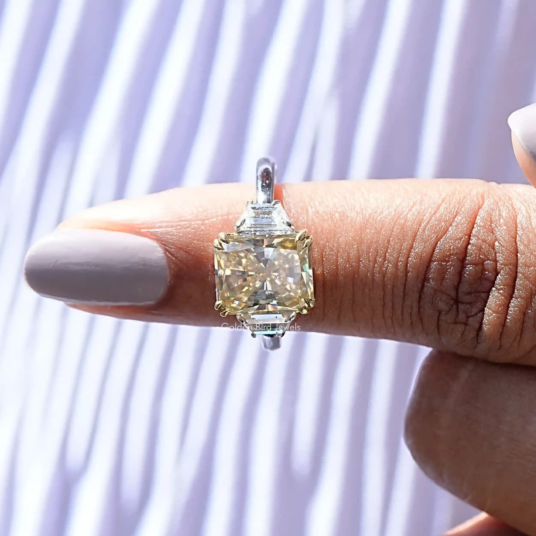 In finger front View of Radiant Cut Moissanite Engagement Ring