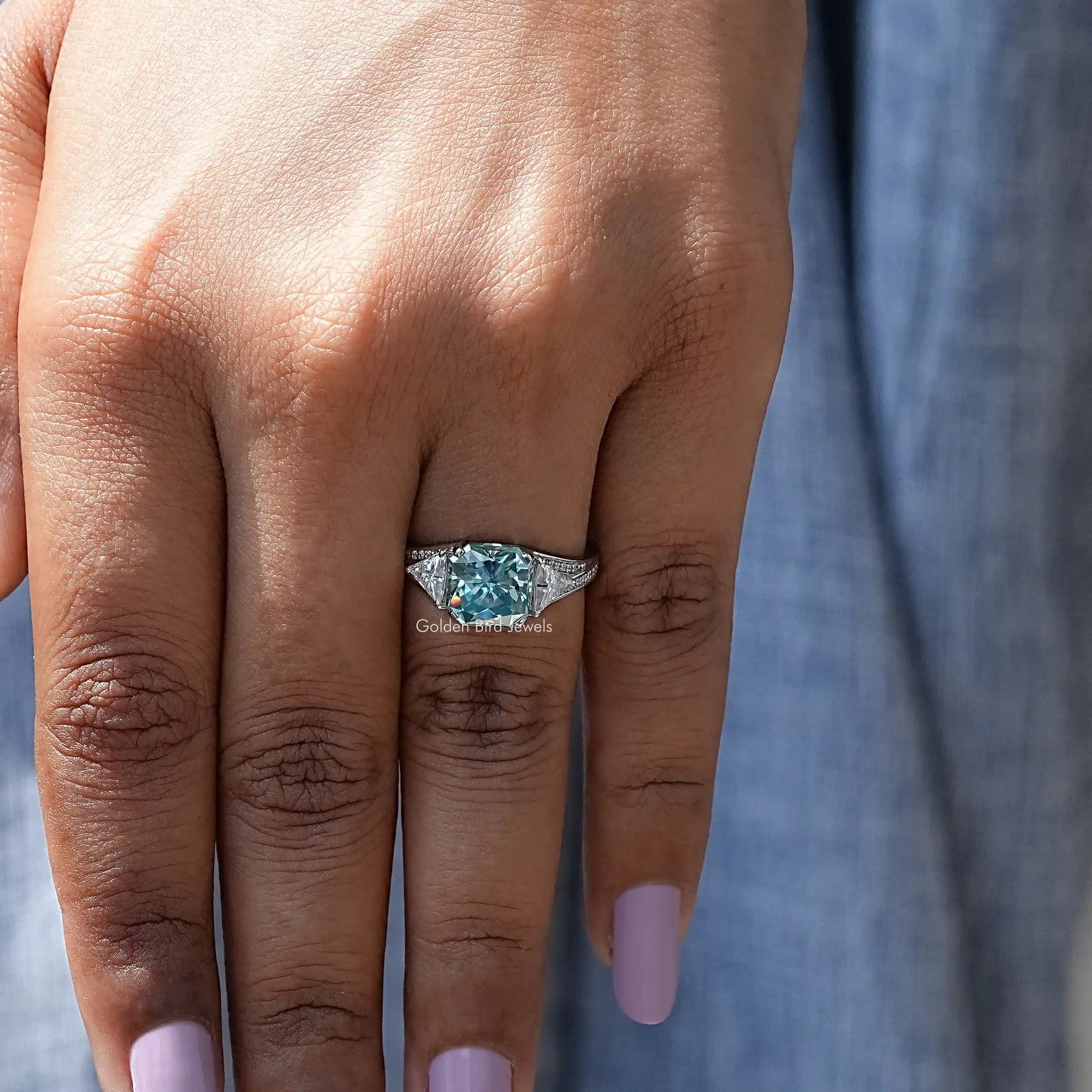 Radiant And Triangle Cut Moissanite Ring In finger
