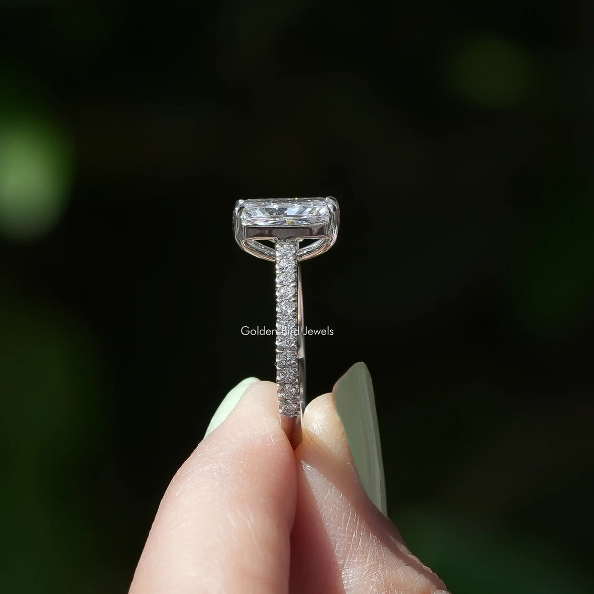 Side View of Radiant Cut Solitaire Lab Grown Ring In two fingers