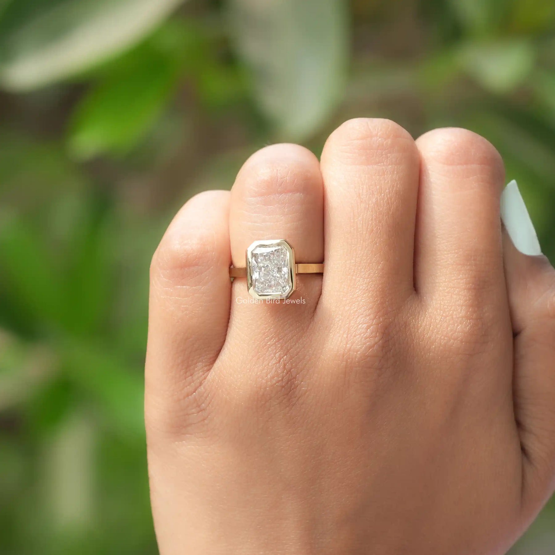 View of Diamond Bezel Set Solitaire Ring In Yellow Gold