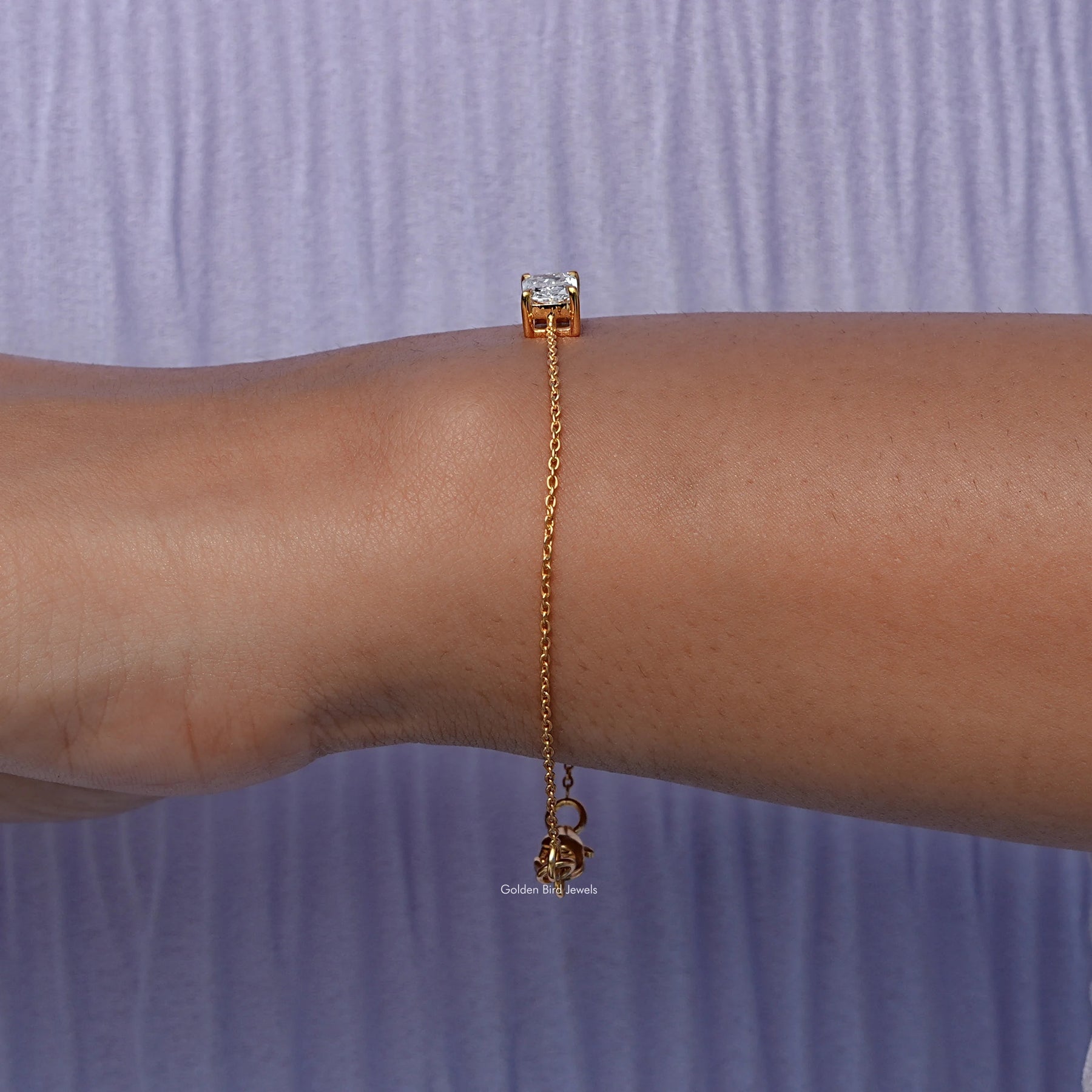 Side view of lab Radiant Cut Bracelet In yellow Gold