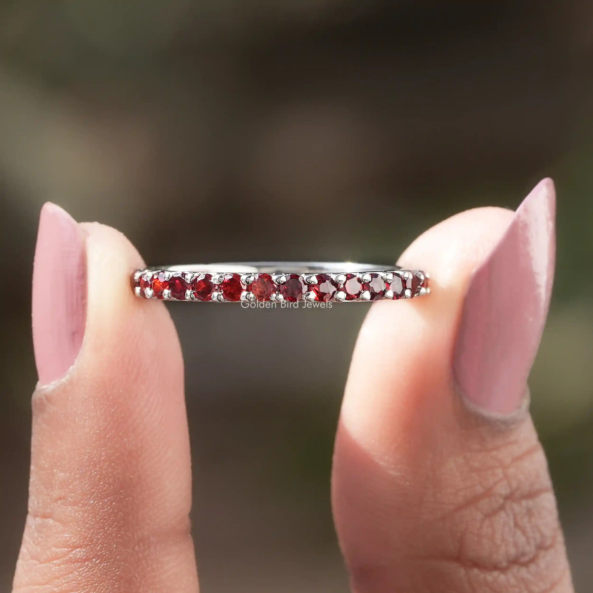 Front view of Red Garnet Round Gemstone Half Eternity Band