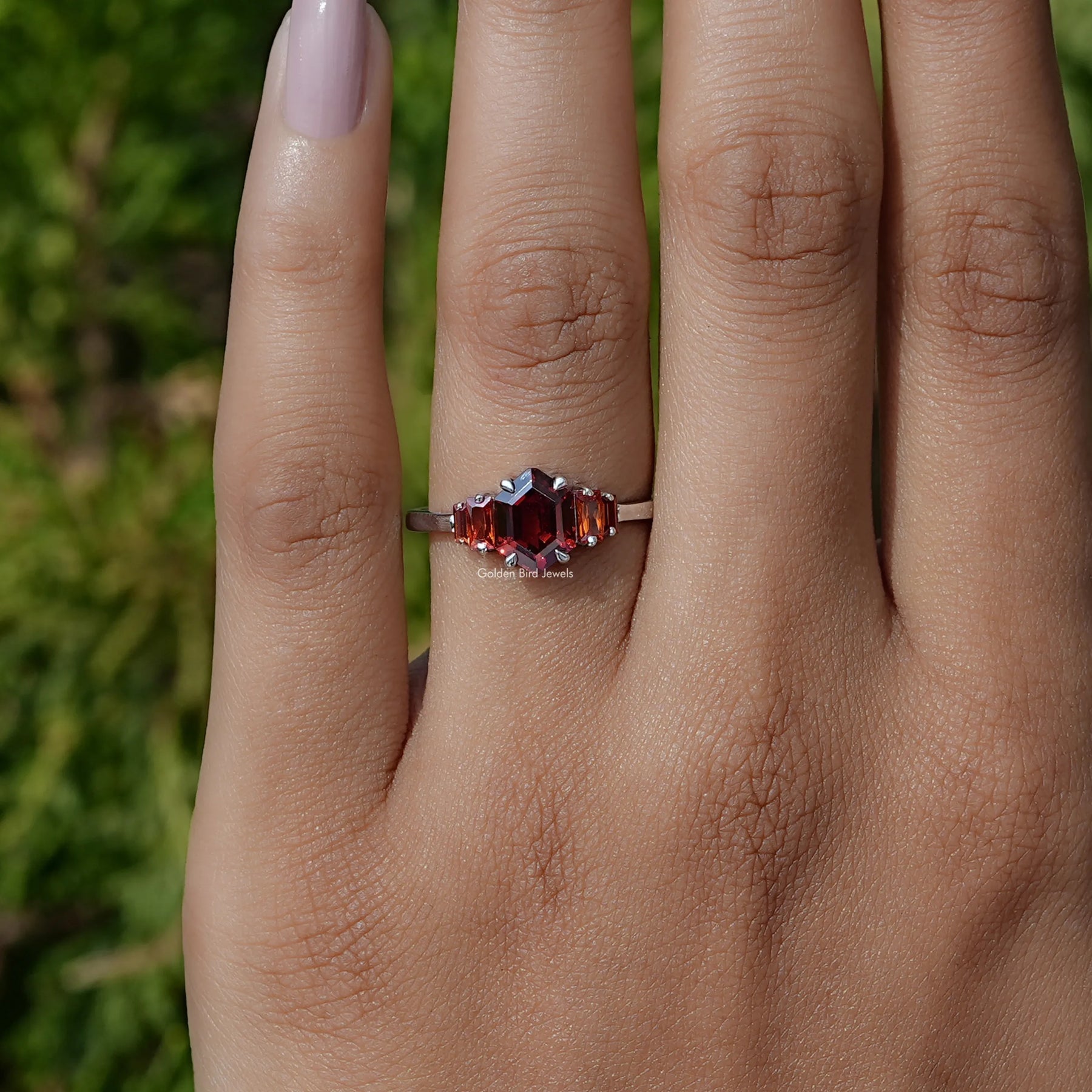 In Finger front view of Red Ruby Hexagon Gemstone 5 Stone Ring In White Gold