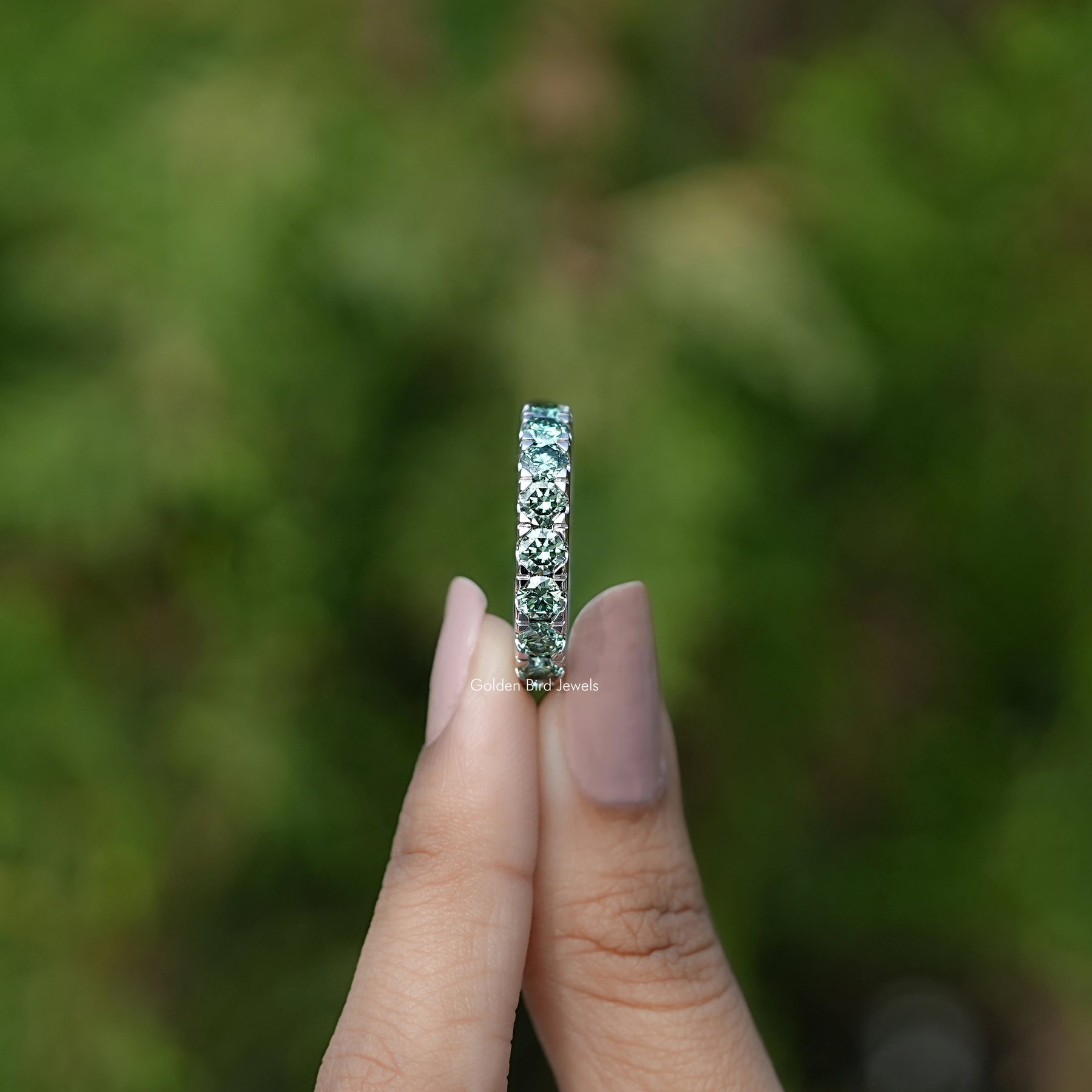 Side View of Green Round Cut Moissanite Eternity Band
