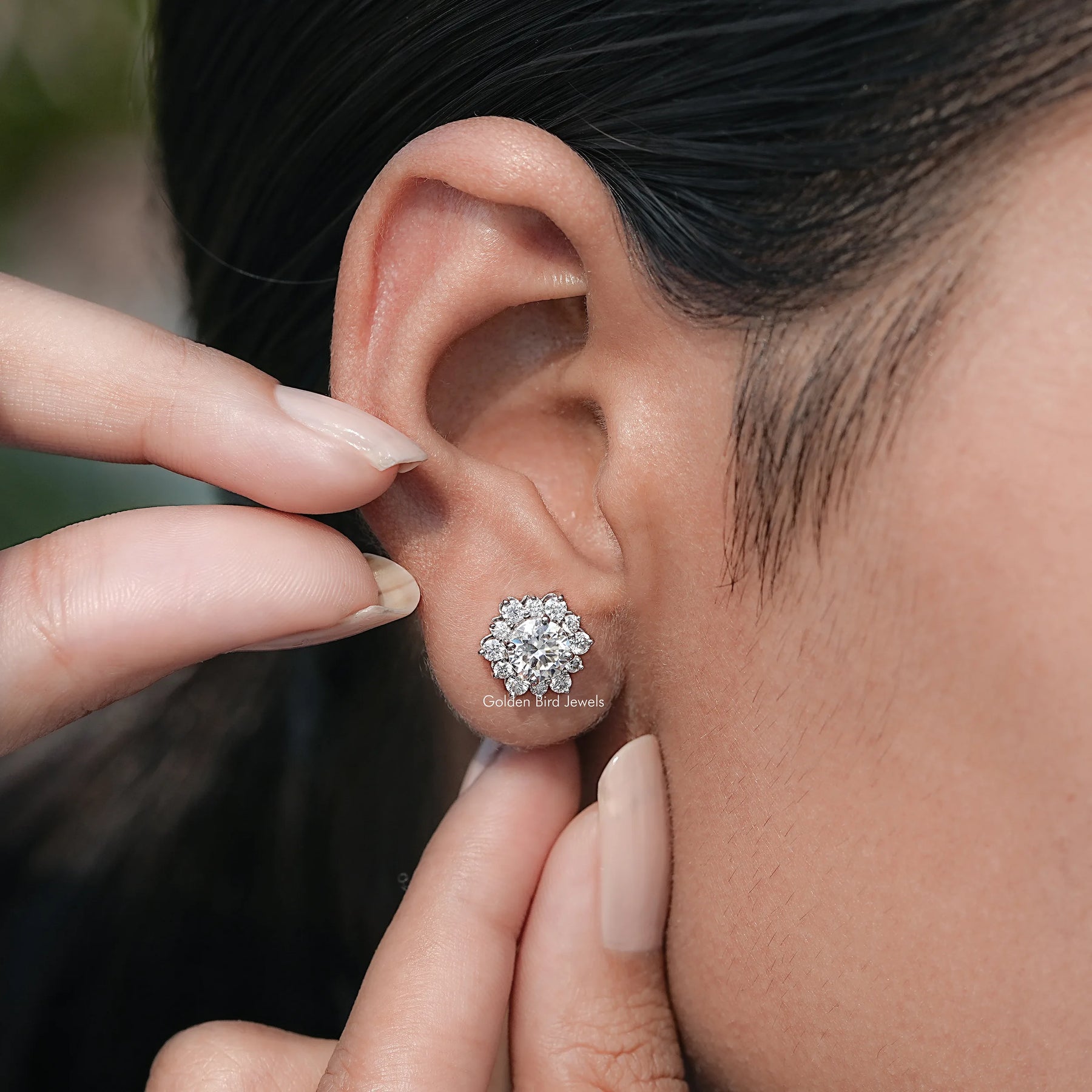 close view of Round Cut Moissanite earrings