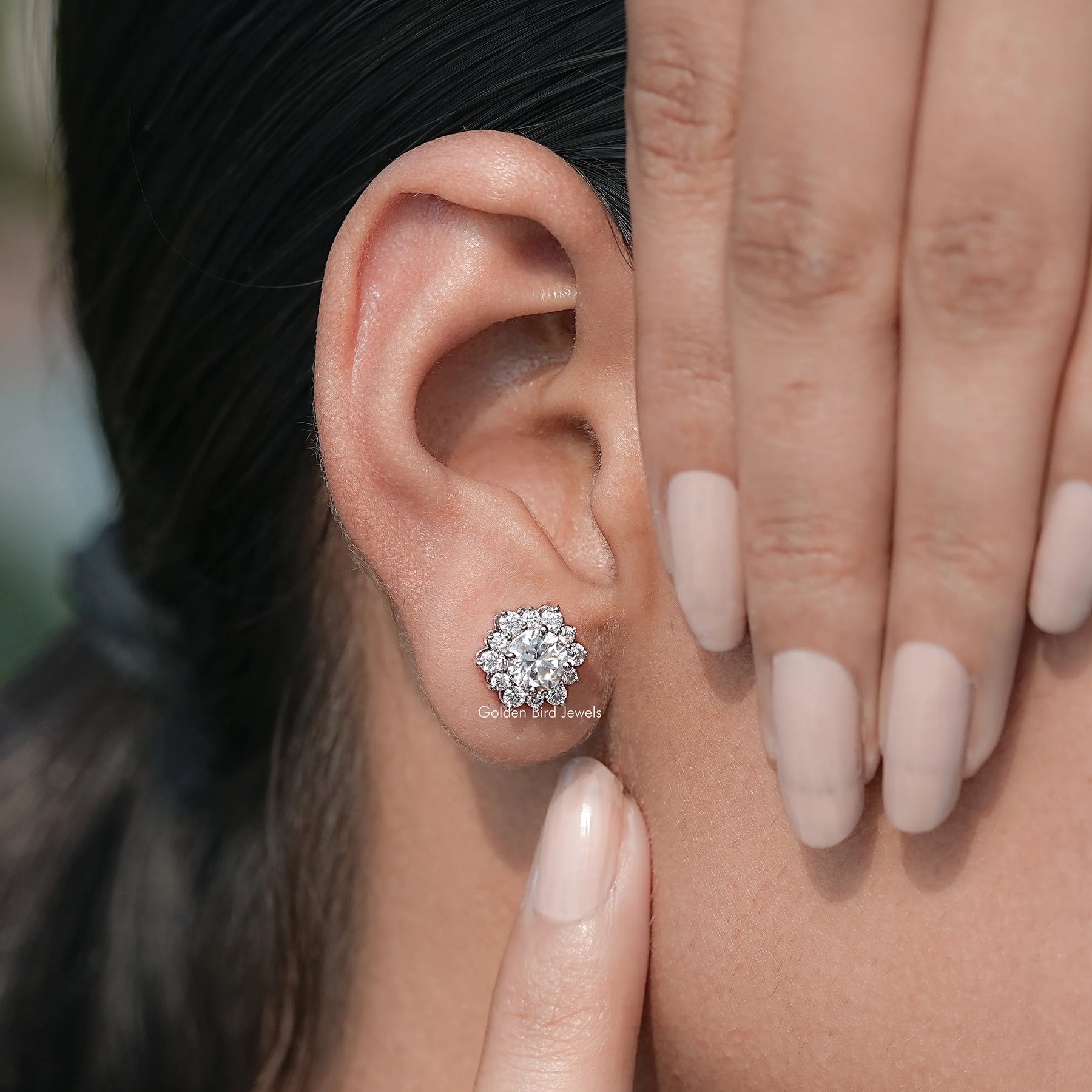 Detailed view of moissanite earrings in secure setting
