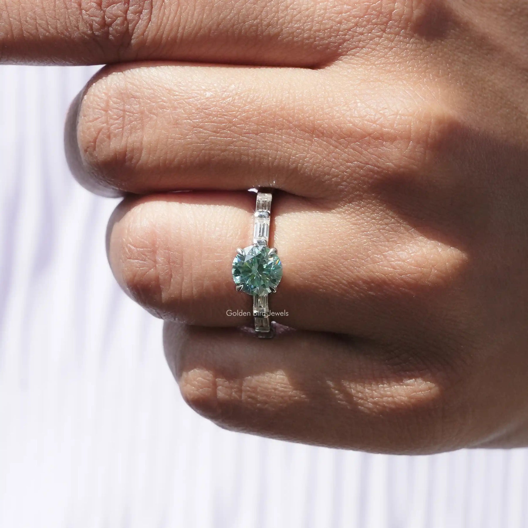 Close-Up View of Round Cut Engagement Ring In White Gold