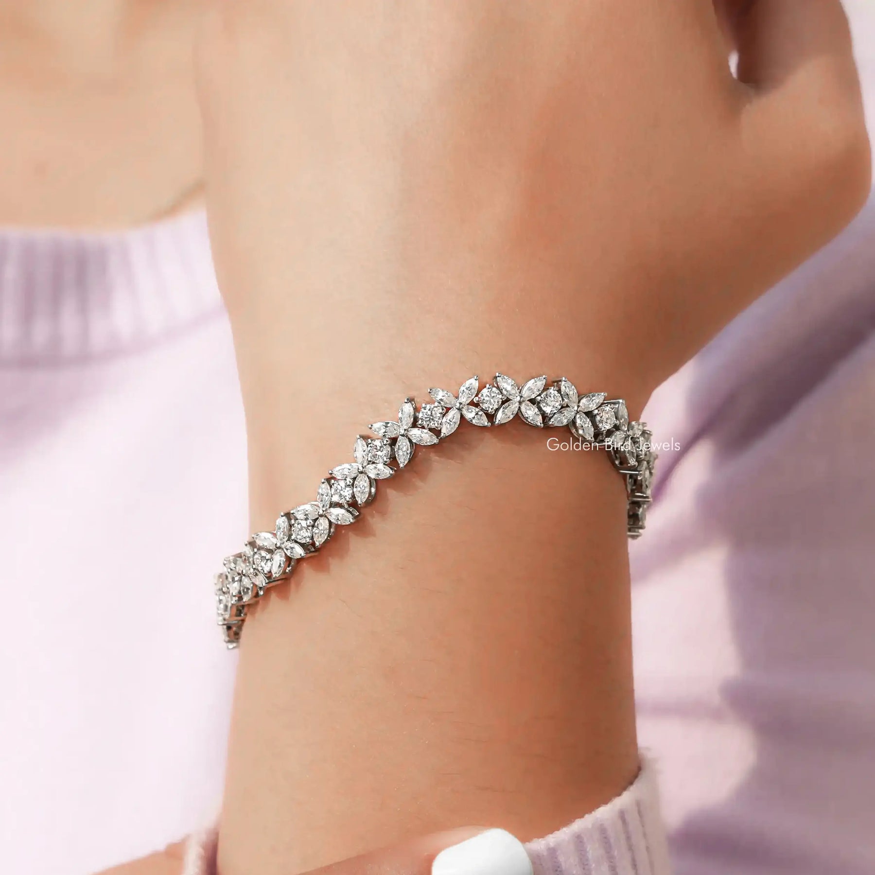 In Hand Front View of Marquise Cut Lab Diamond Multi Stone Bracelet In White Gold